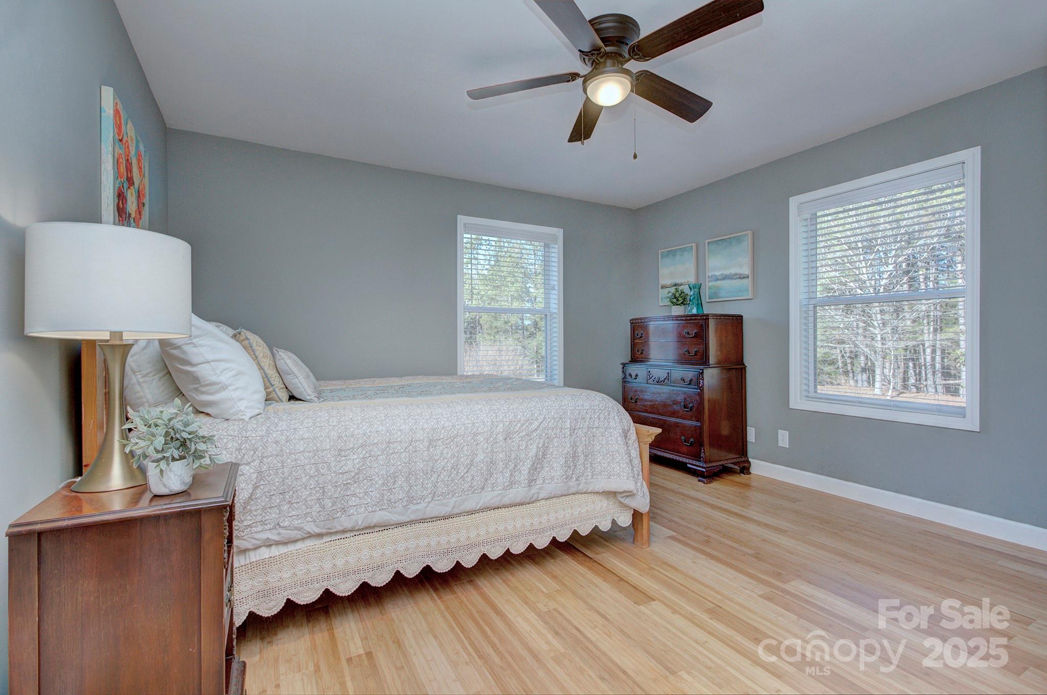 1615 Deer Run Road Catawba, SC 29704 - Photo 21 of 31 a bedroom with a bed wooden floor and window