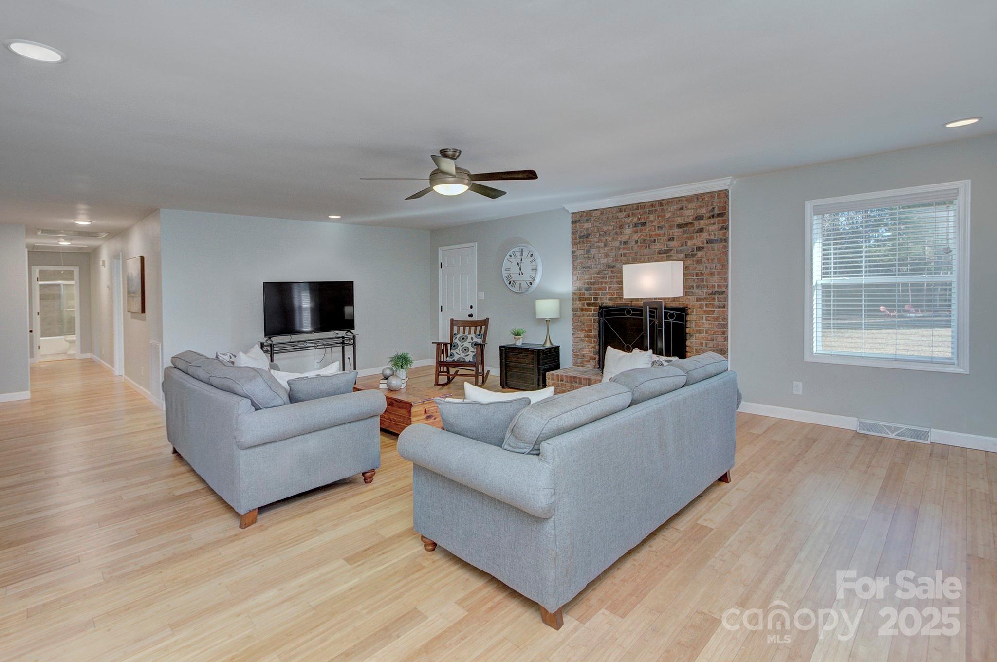 1615 Deer Run Road Catawba, SC 29704 - Photo 7 of 31 a living room with furniture and a large window