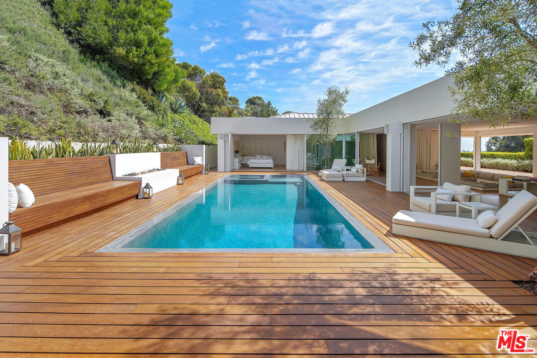 1106 North Hillcrest Road Beverly Hills, CA 90210 - Photo 3 of 54 swimming pool view with seating space