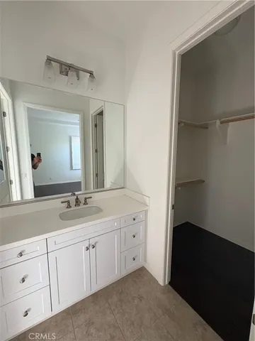 a view of cabinets and window