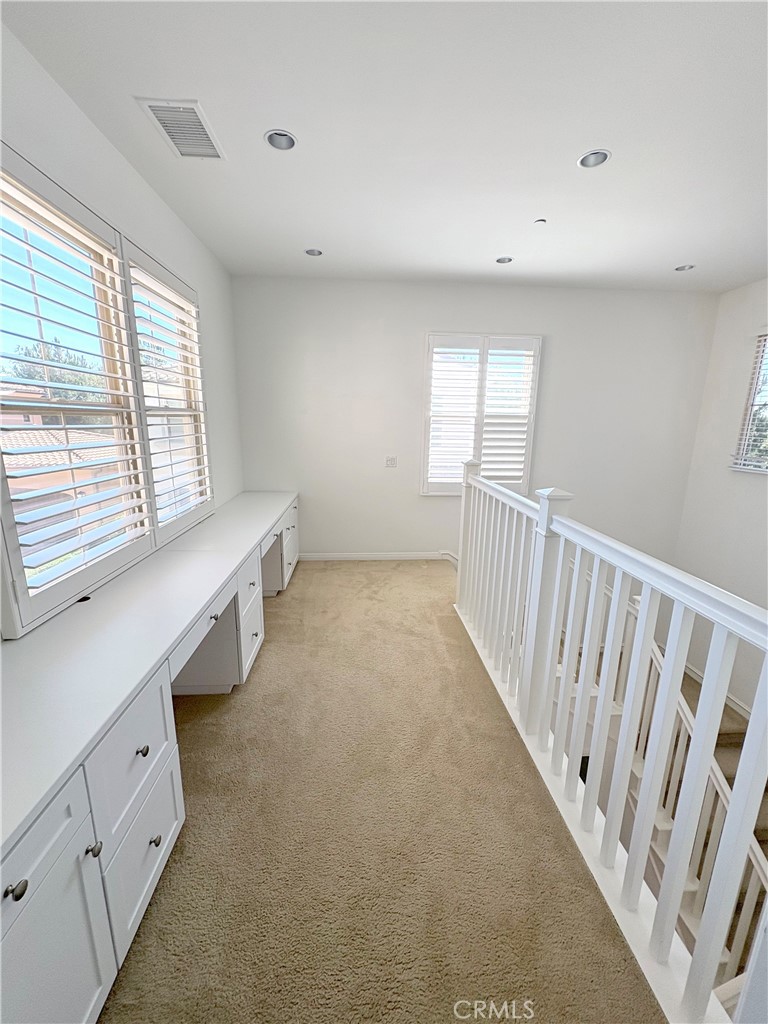 89 Field Poppy Irvine, CA 92620 - Photo 22 of 37 wooden floor in an empty room with a window