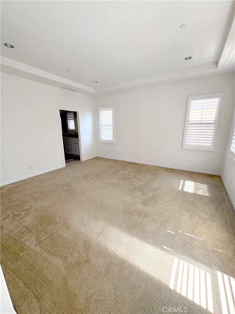 89 Field Poppy Irvine, CA 92620 - Photo 24 of 37 an empty room with windows