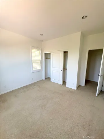 a bathroom with a shower and a toilet