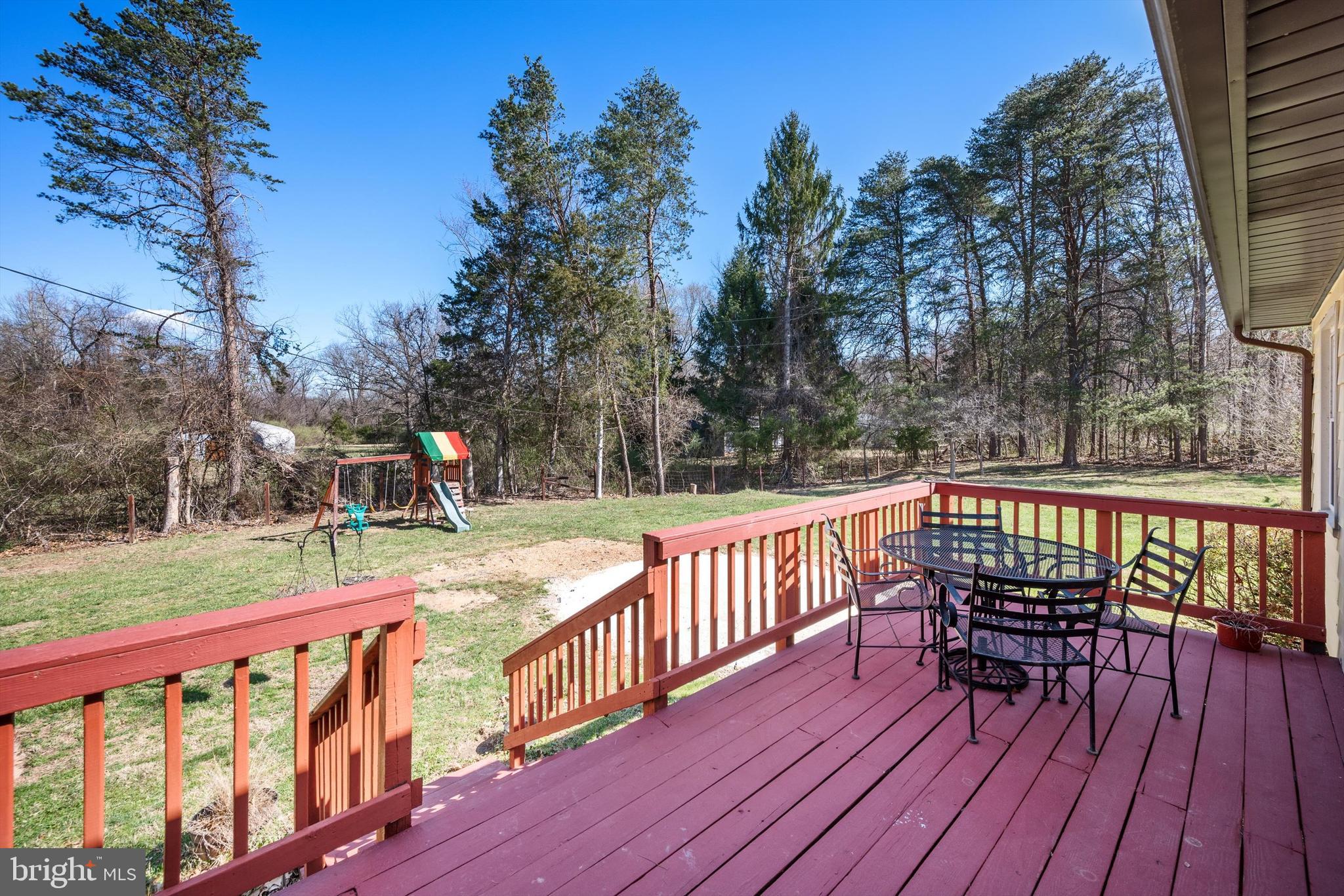 6521 Howellsville Road Front Royal, VA 22630 - Photo 13 of 46 a view of deck with a chairs on deck