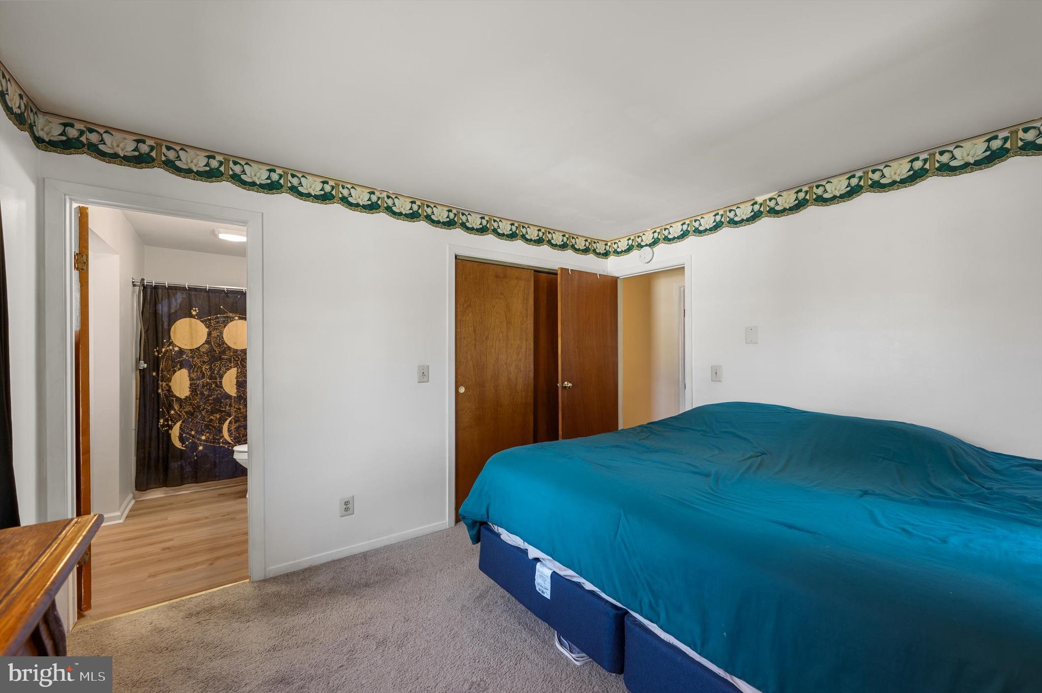 6521 Howellsville Road Front Royal, VA 22630 - Photo 15 of 46 a bedroom with a bed and a table