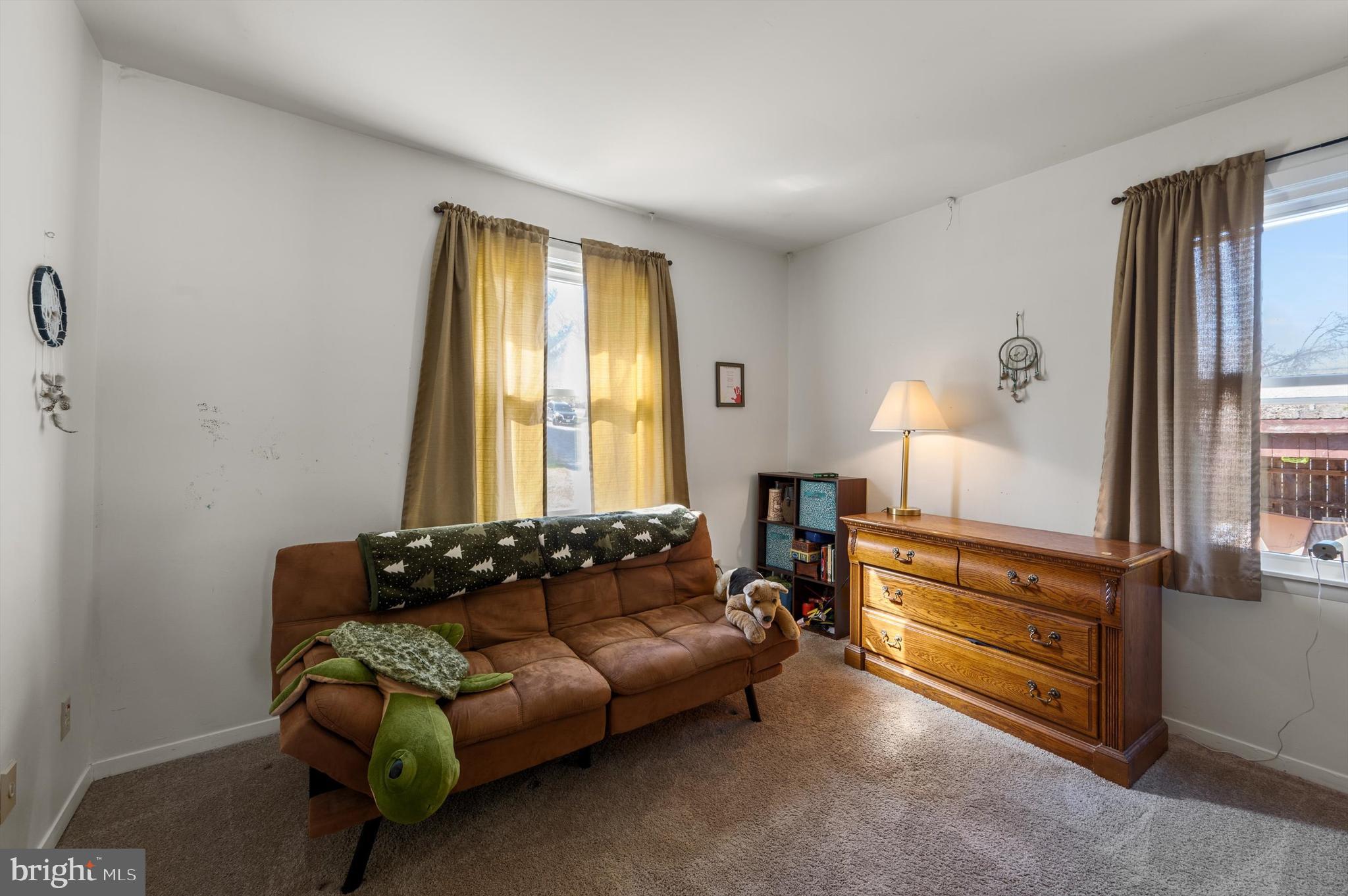 6521 Howellsville Road Front Royal, VA 22630 - Photo 18 of 46 a living room with furniture and a window