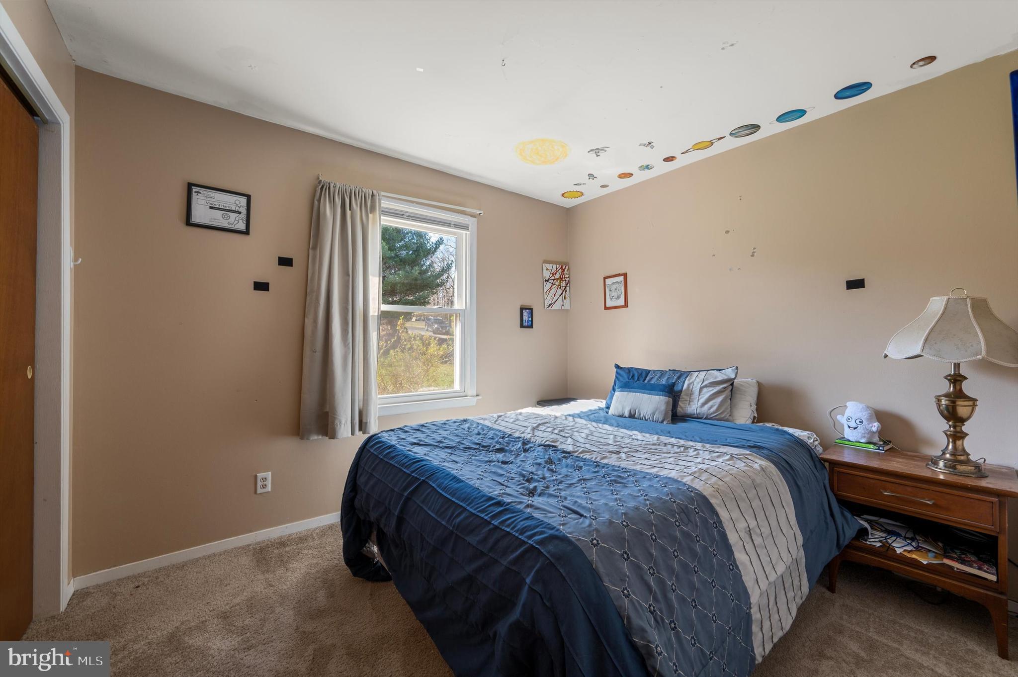 6521 Howellsville Road Front Royal, VA 22630 - Photo 20 of 46 a bedroom with a bed and window