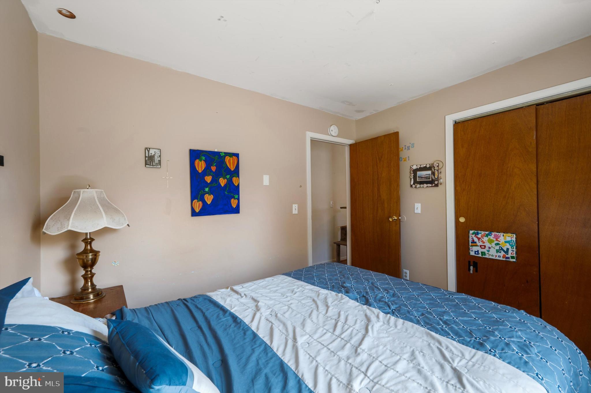 6521 Howellsville Road Front Royal, VA 22630 - Photo 21 of 46 a bedroom with a bed and a dresser