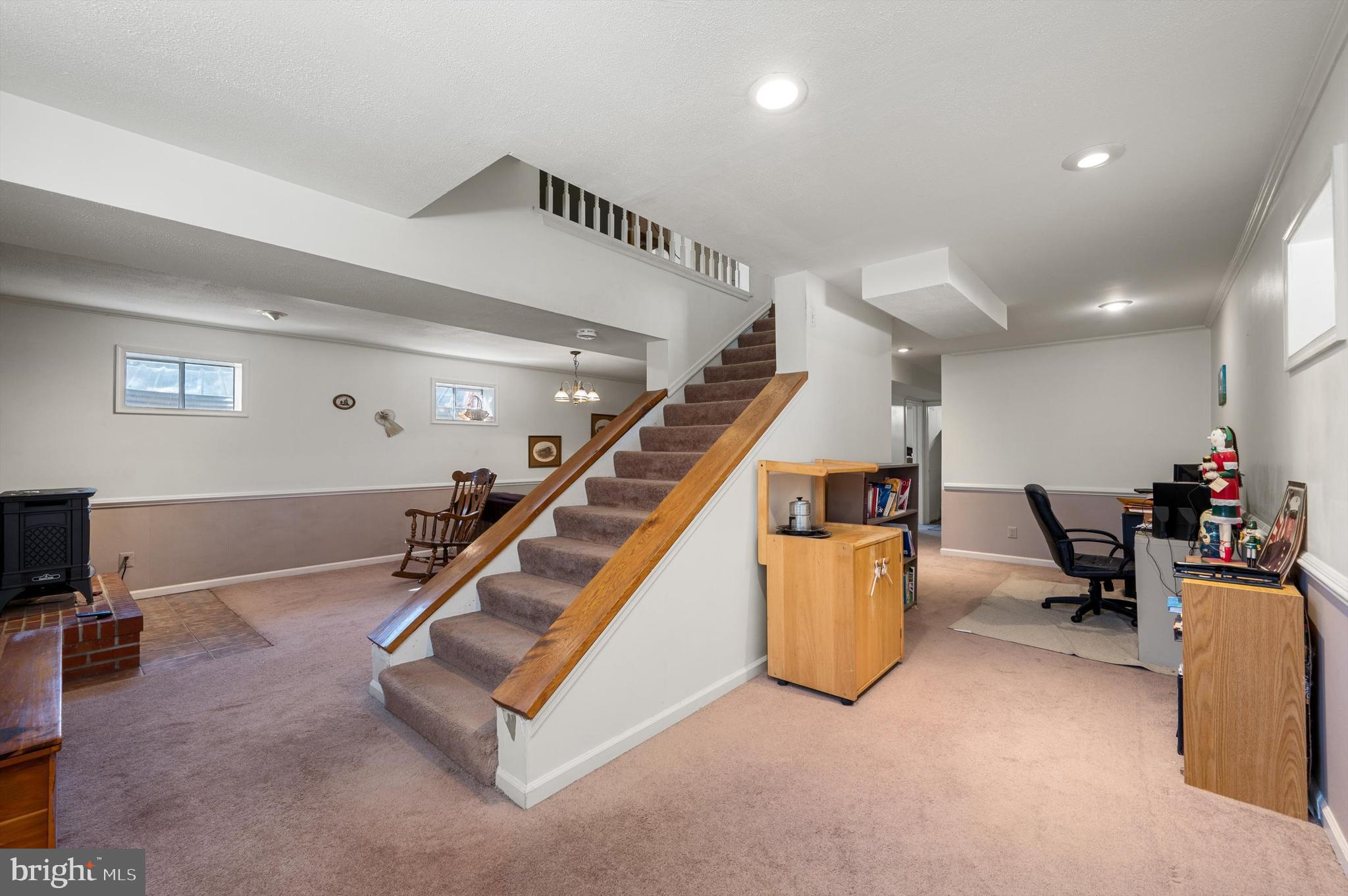 6521 Howellsville Road Front Royal, VA 22630 - Photo 24 of 46 a living room with furniture and stairs