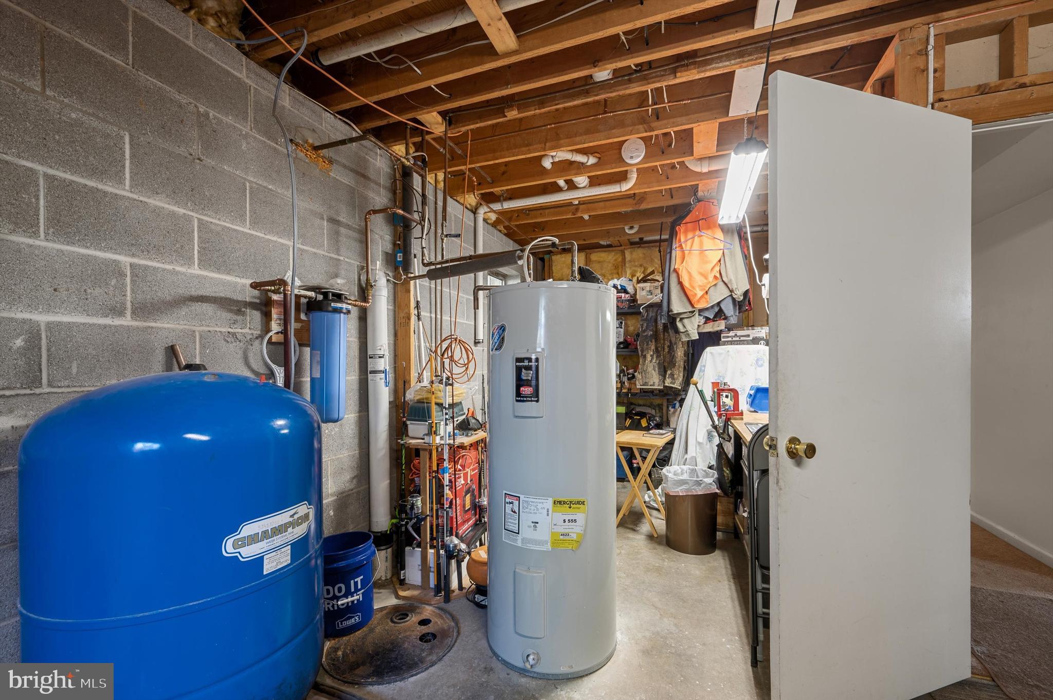 6521 Howellsville Road Front Royal, VA 22630 - Photo 31 of 46 a view of walk in closet with clothes and shoes