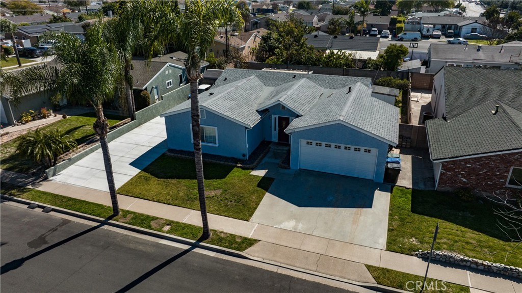 5512 Marcella Avenue Cypress, CA 90630 - Photo 2 of 39 an aerial view of a house with swimming pool and outdoor seating