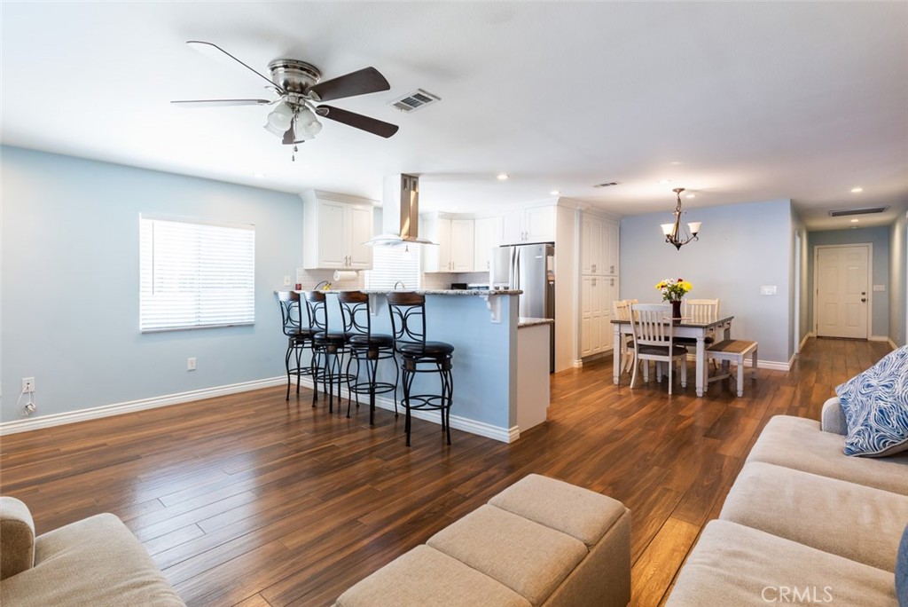 5512 Marcella Avenue Cypress, CA 90630 - Photo 24 of 39 a living room with furniture and kitchen view