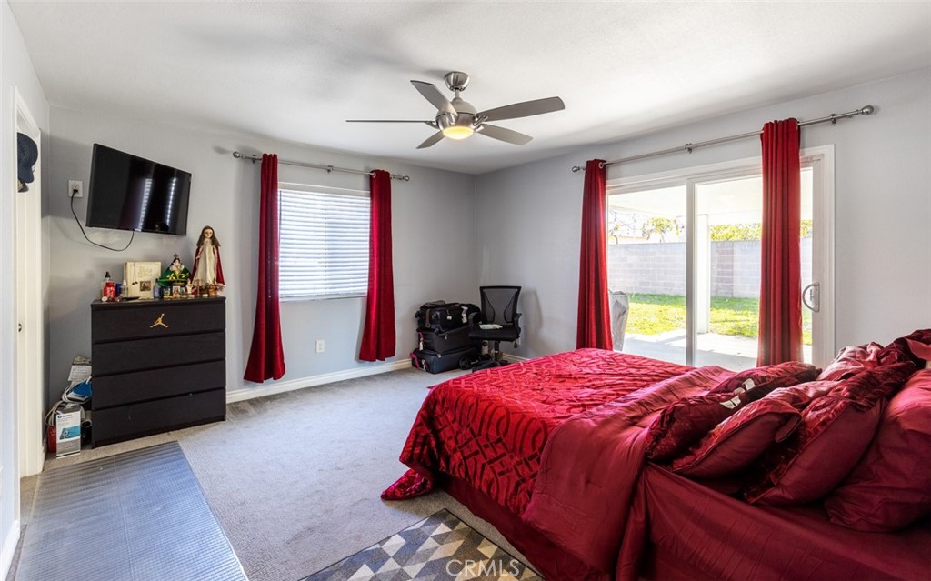 5512 Marcella Avenue Cypress, CA 90630 - Photo 26 of 39 a bed room with a bed and a television