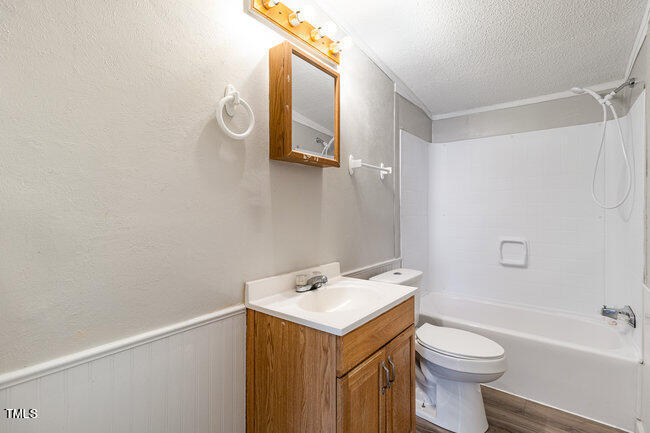 437 West Northpoint Road Spring Lake, NC 28390 - Photo 19 of 27 a bathroom with a sink a toilet and shower