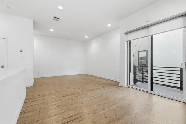 a view of hallway with washer and dryer