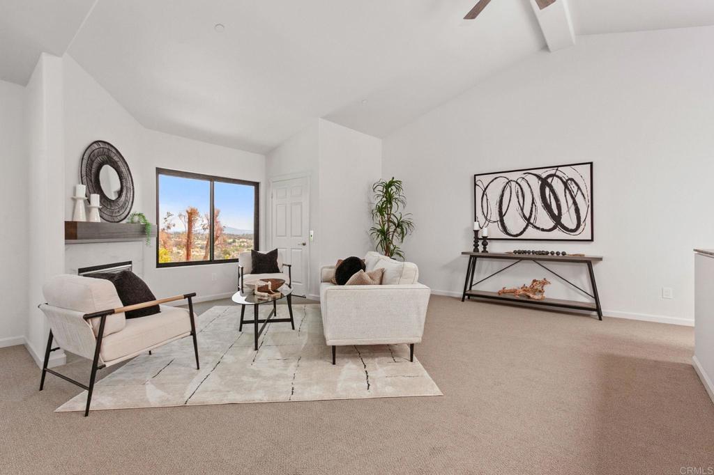 597 Via Cantebria Encinitas, CA 92024 - Photo 6 of 41 a living room with furniture and a painting on the wall