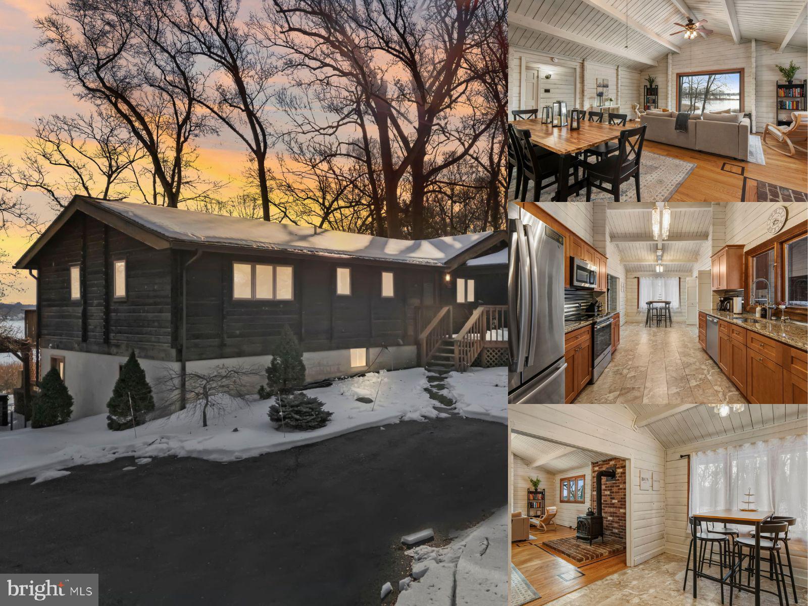 a view of a patio with table and chairs with wooden floor and fence