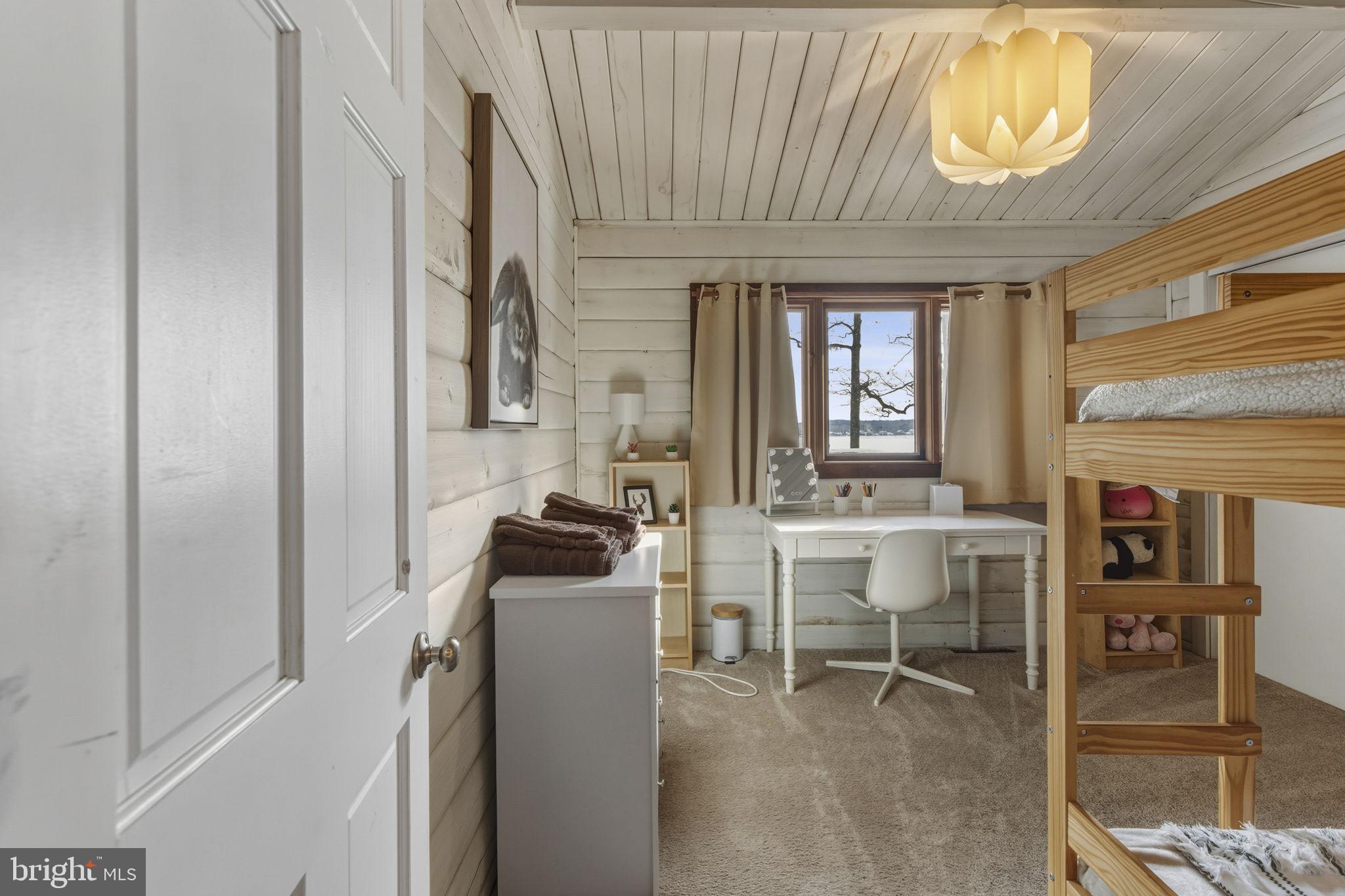 137 Plum Point Road Elkton, MD 21921 - Photo 22 of 54 a view of a workspace with furniture and window