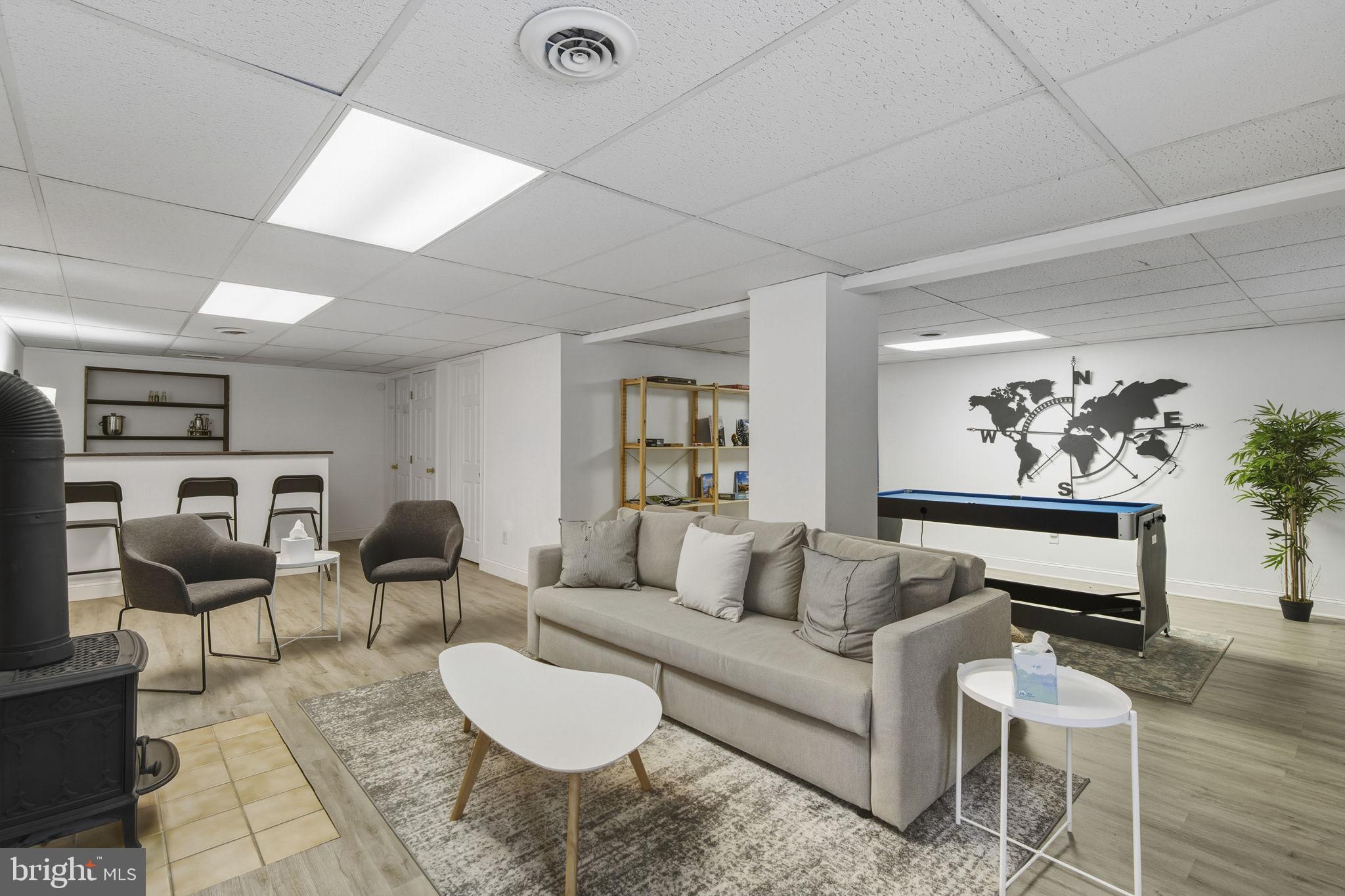 137 Plum Point Road Elkton, MD 21921 - Photo 28 of 54 a living room with furniture and a rug