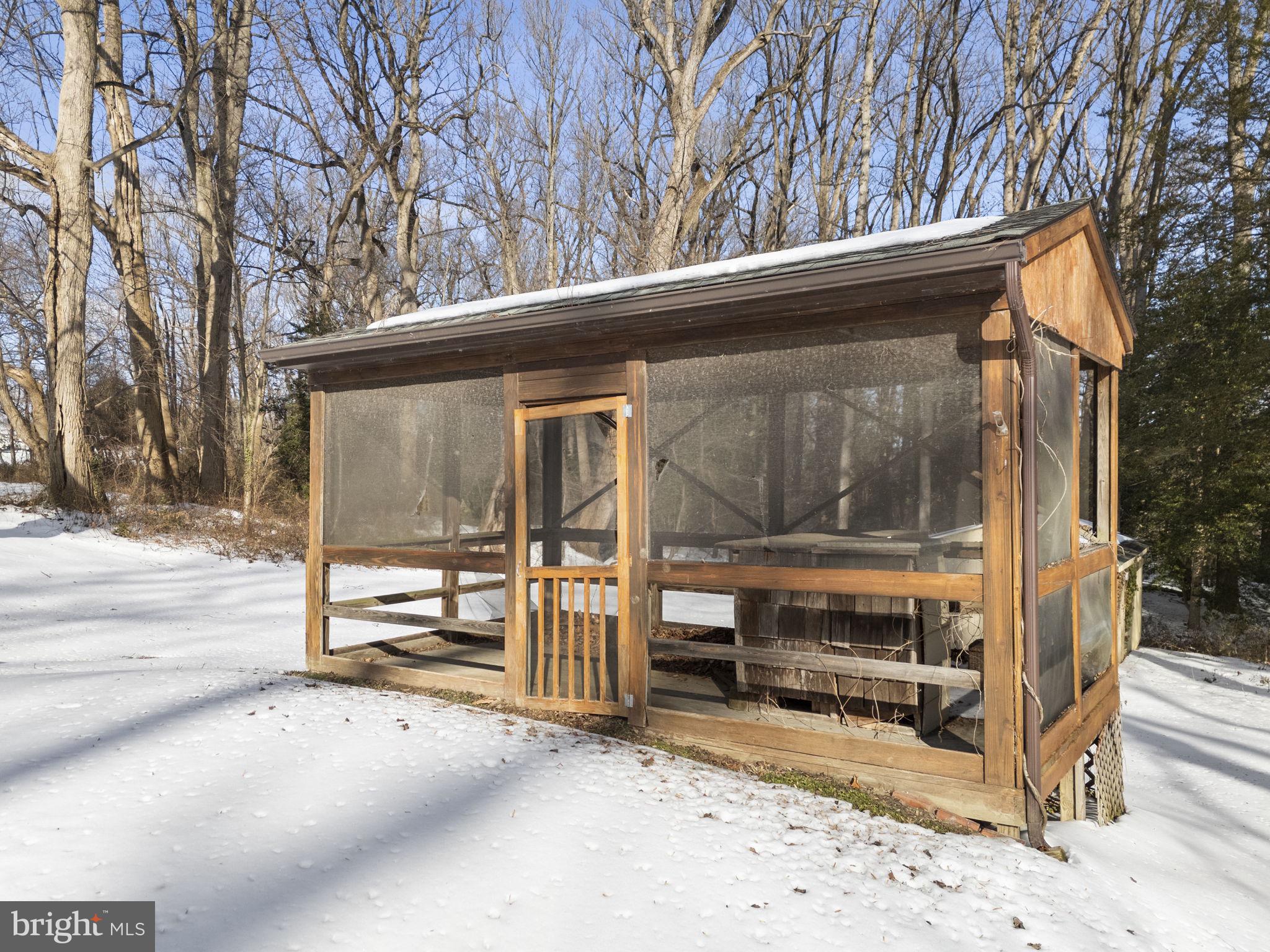 137 Plum Point Road Elkton, MD 21921 - Photo 32 of 54 a backyard of a house with barbeque oven wooden floor and a view of outdoor space