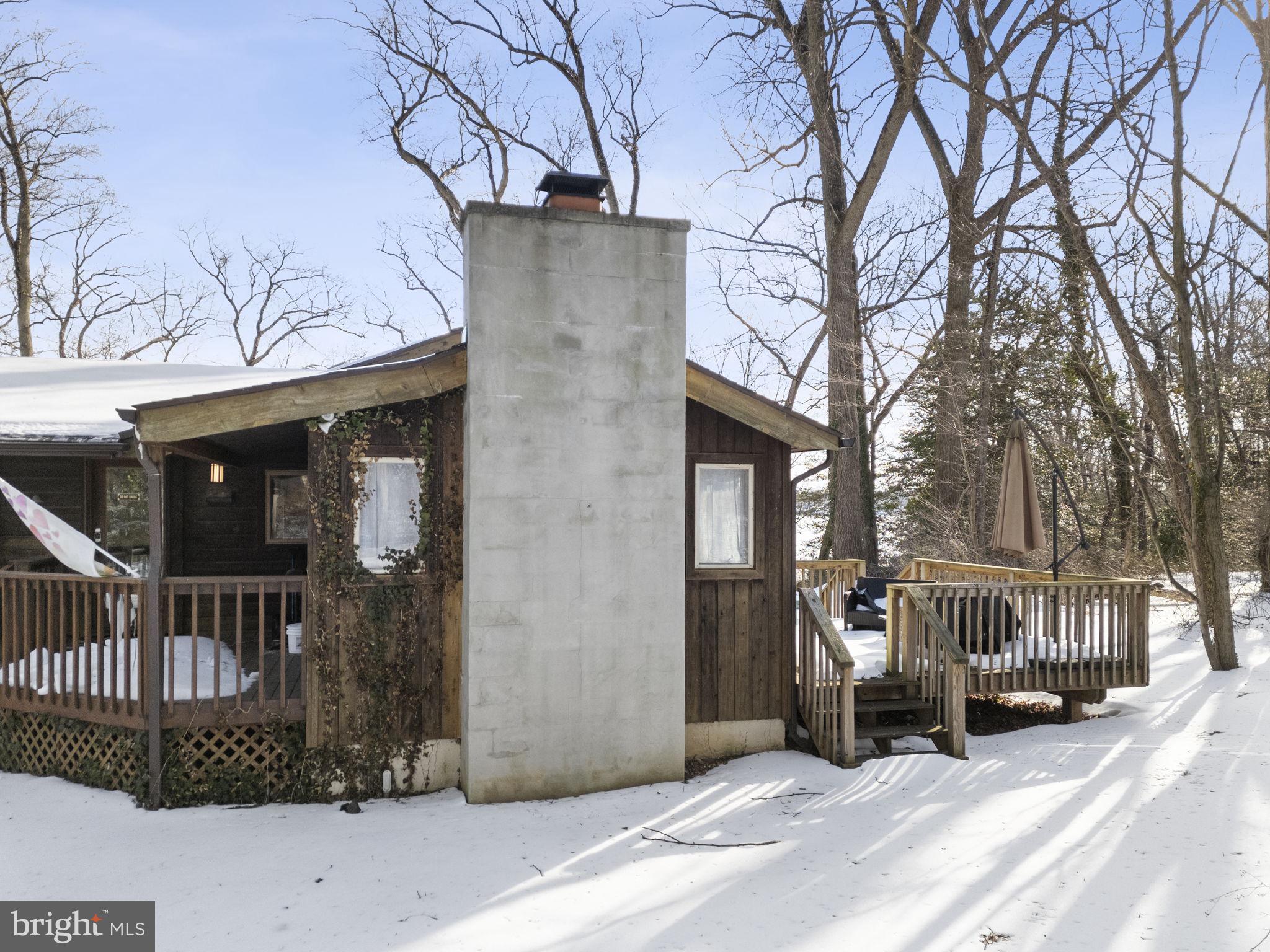 137 Plum Point Road Elkton, MD 21921 - Photo 46 of 54 a view of a house with a snow in the patio