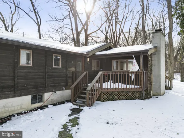 a view of snow on the street