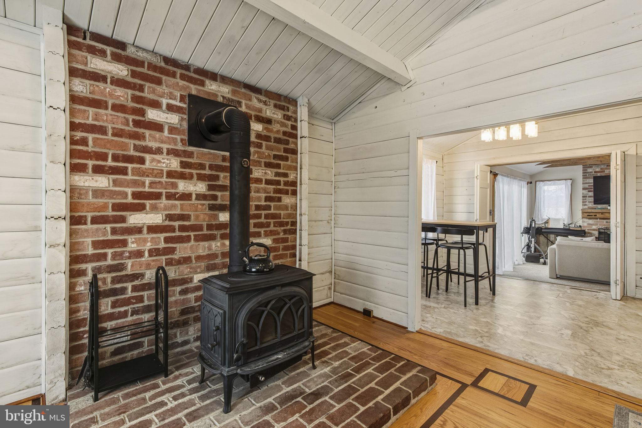 137 Plum Point Road Elkton, MD 21921 - Photo 5 of 54 a view of a hallway with wooden floor and furniture
