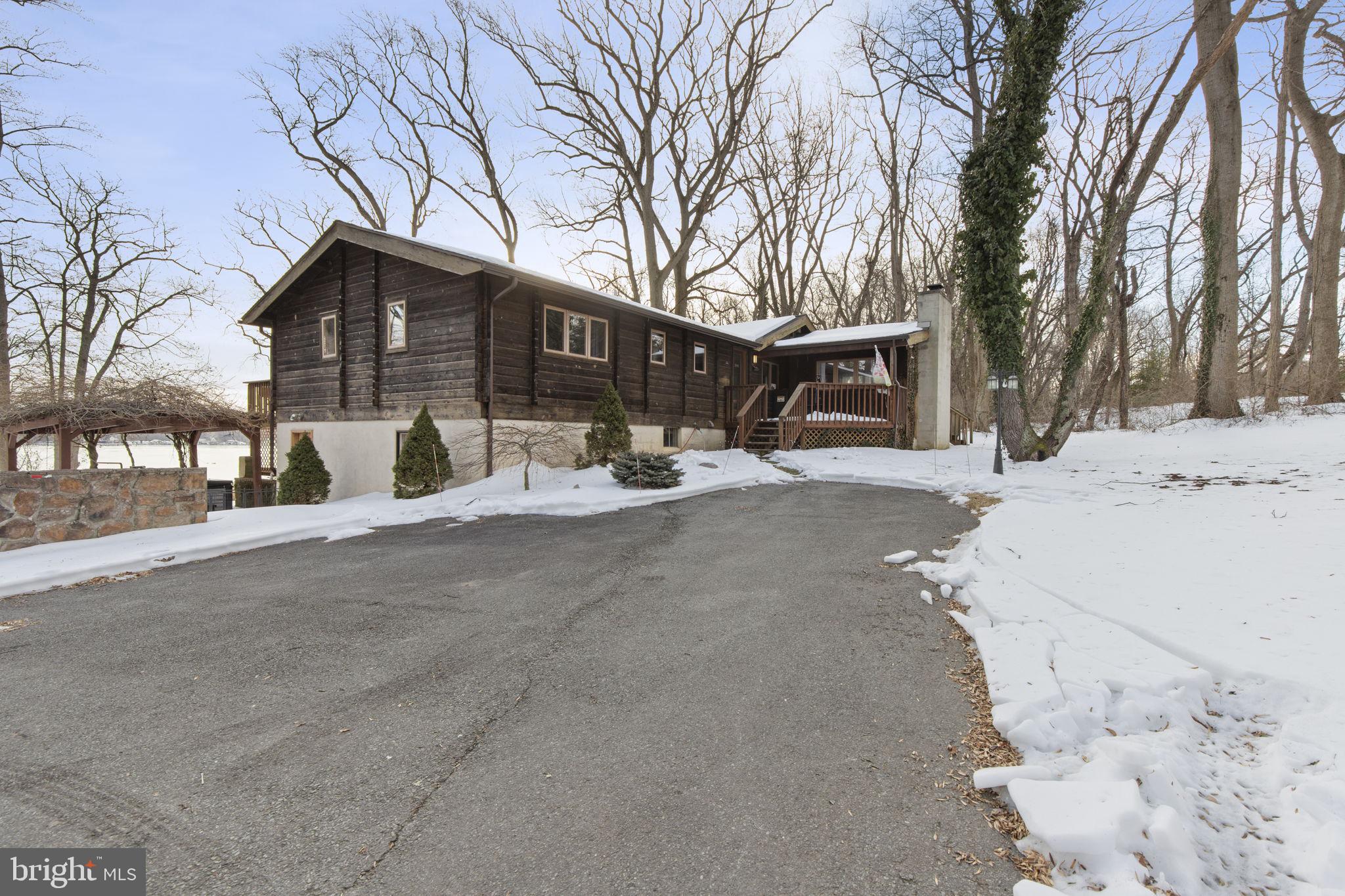 137 Plum Point Road Elkton, MD 21921 - Photo 51 of 54 a view of a house with snow on the road