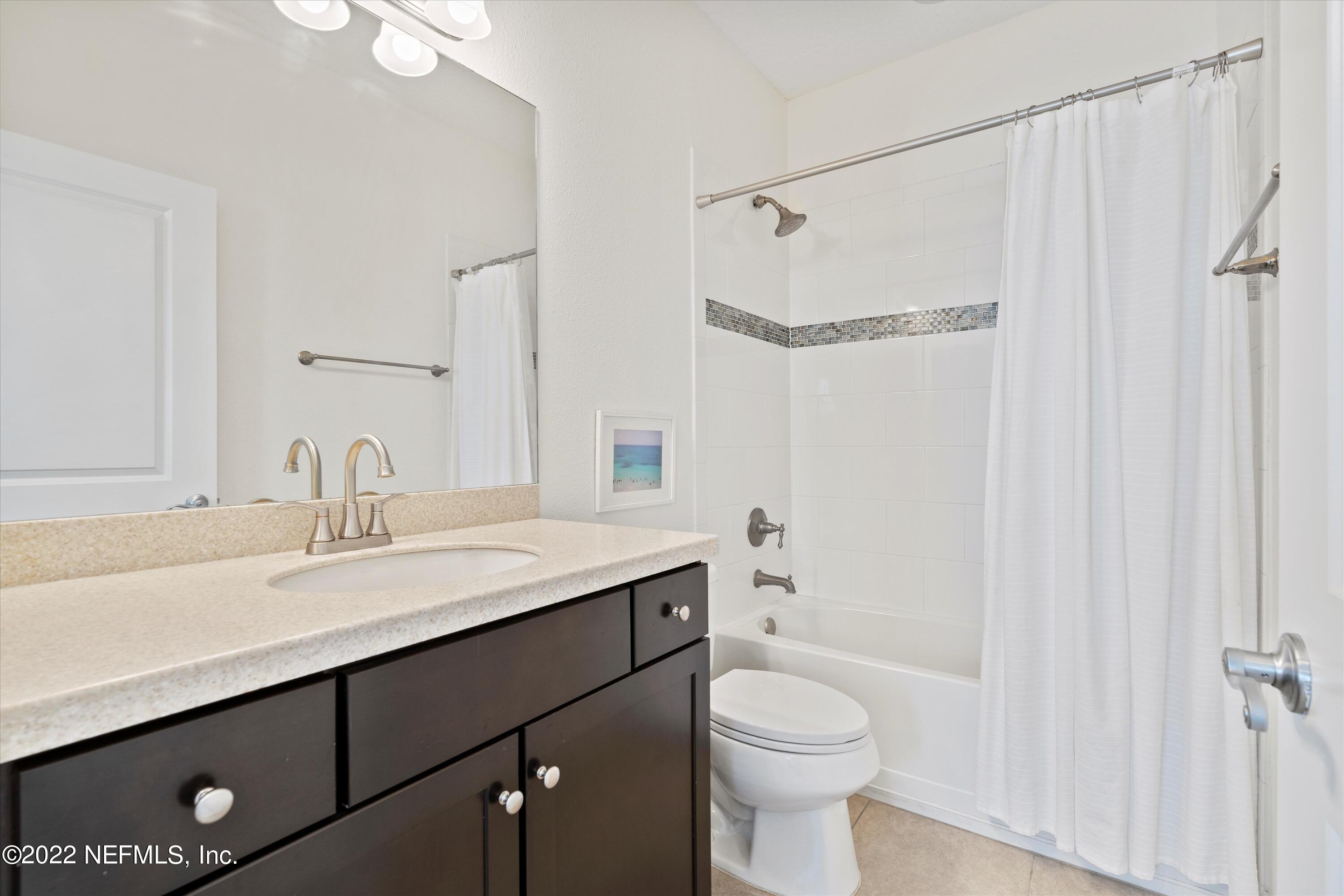 245 Rialto Drive Ponte Vedra, FL 32081 - Photo 26 of 29 a bathroom with a sink a toilet and shower