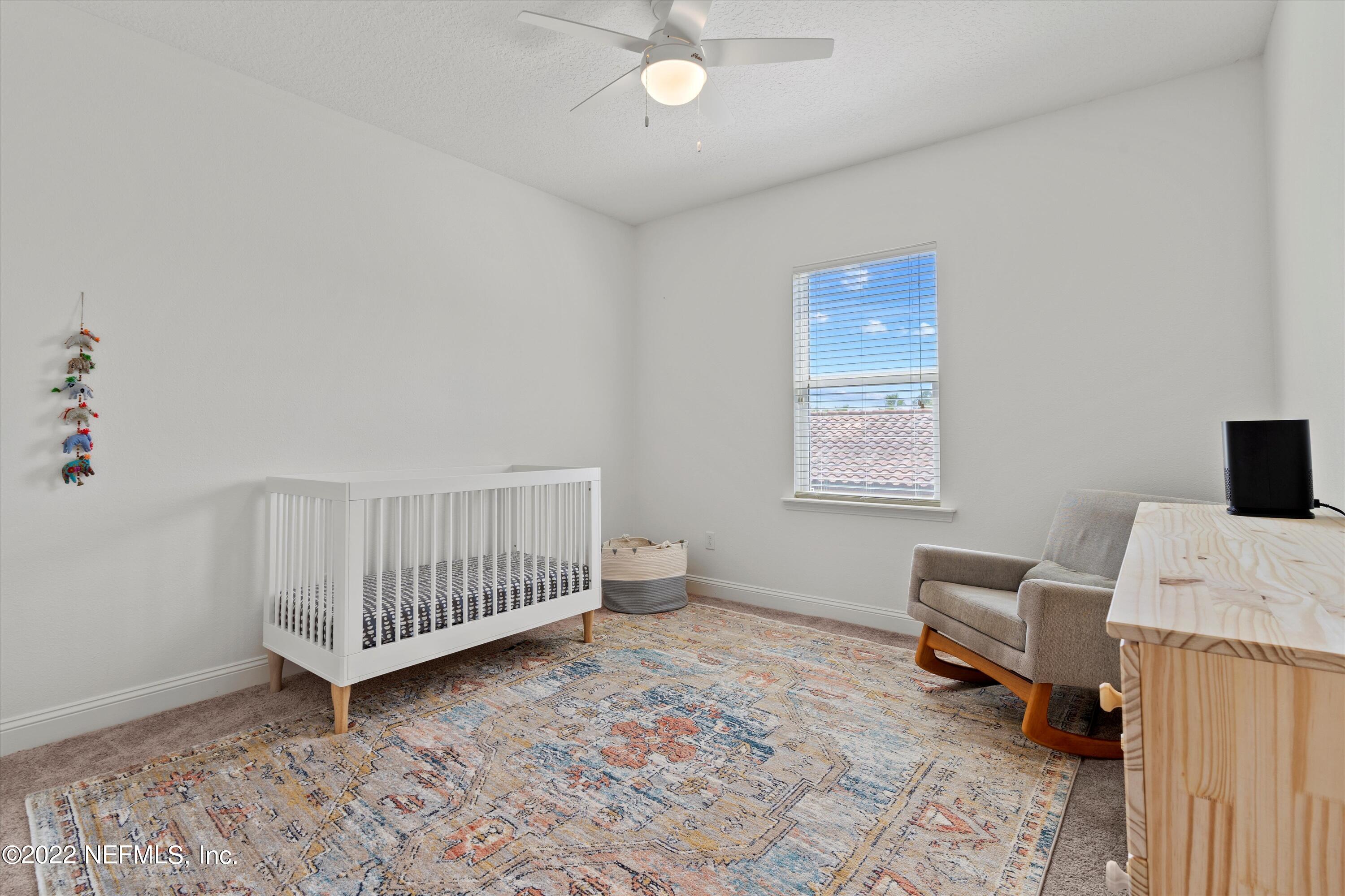 245 Rialto Drive Ponte Vedra, FL 32081 - Photo 27 of 29 a living room with furniture and a window