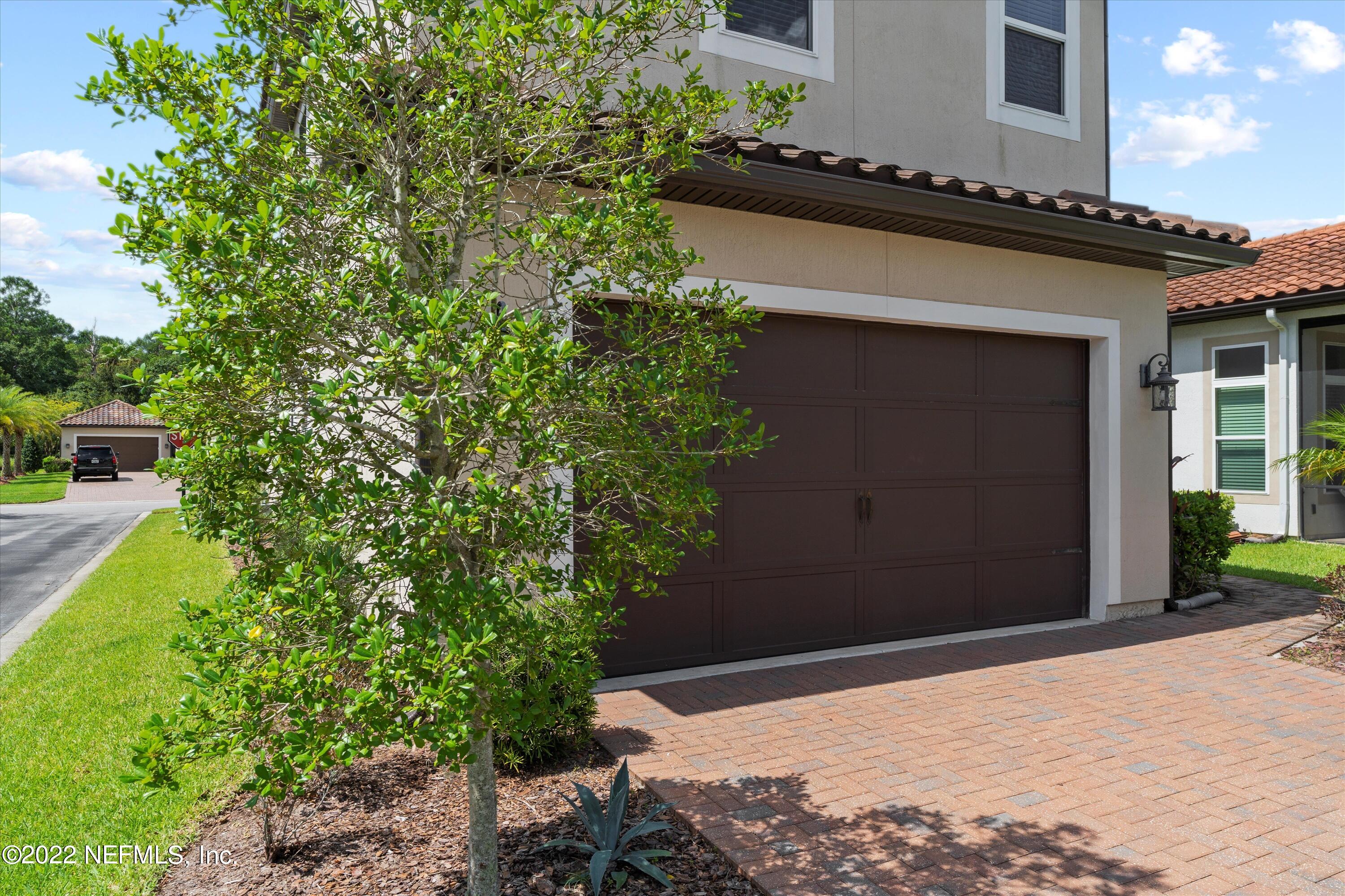 245 Rialto Drive Ponte Vedra, FL 32081 - Photo 29 of 29 a backyard of a house with lots of green space