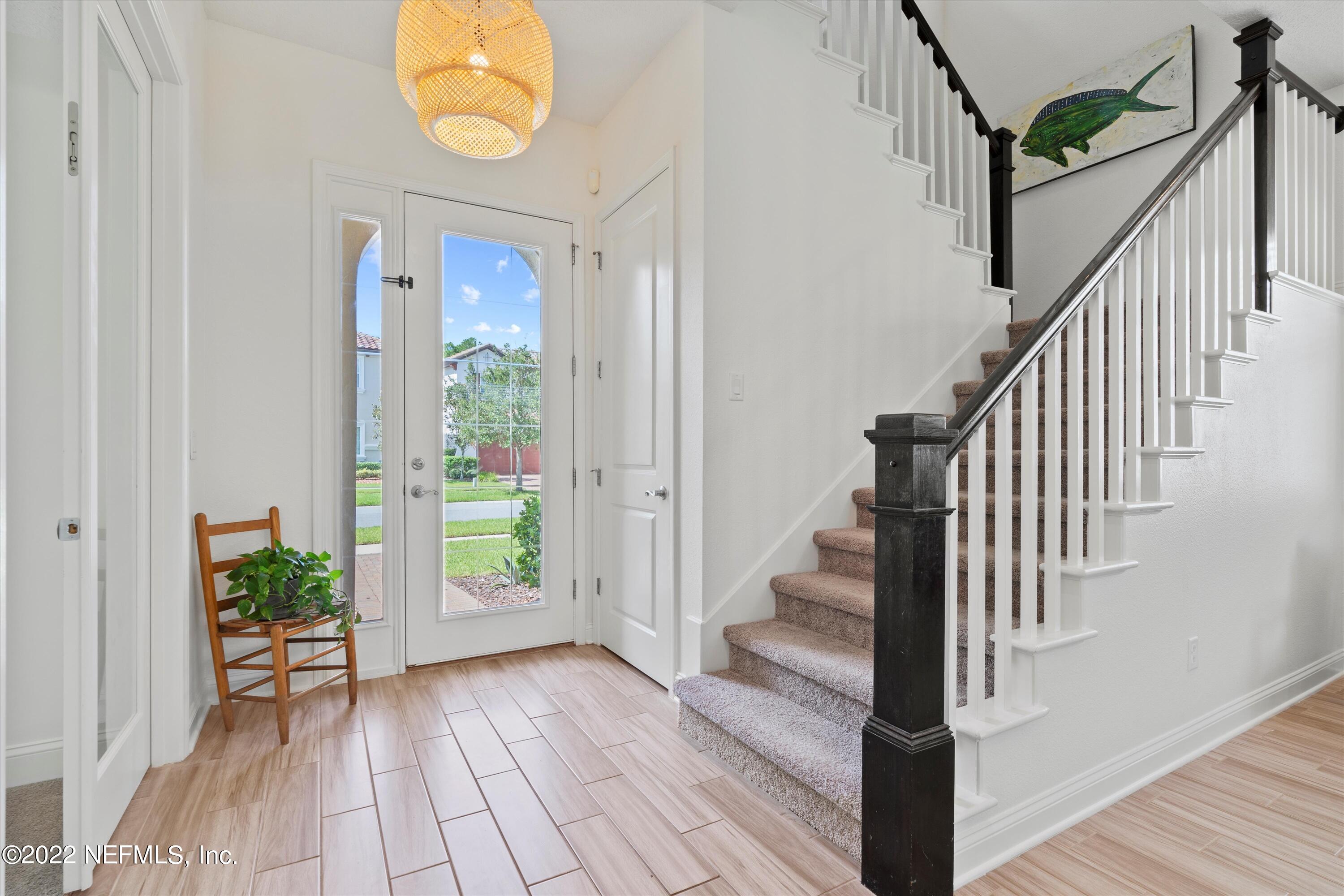 245 Rialto Drive Ponte Vedra, FL 32081 - Photo 4 of 29 a view of an entryway with wooden floor