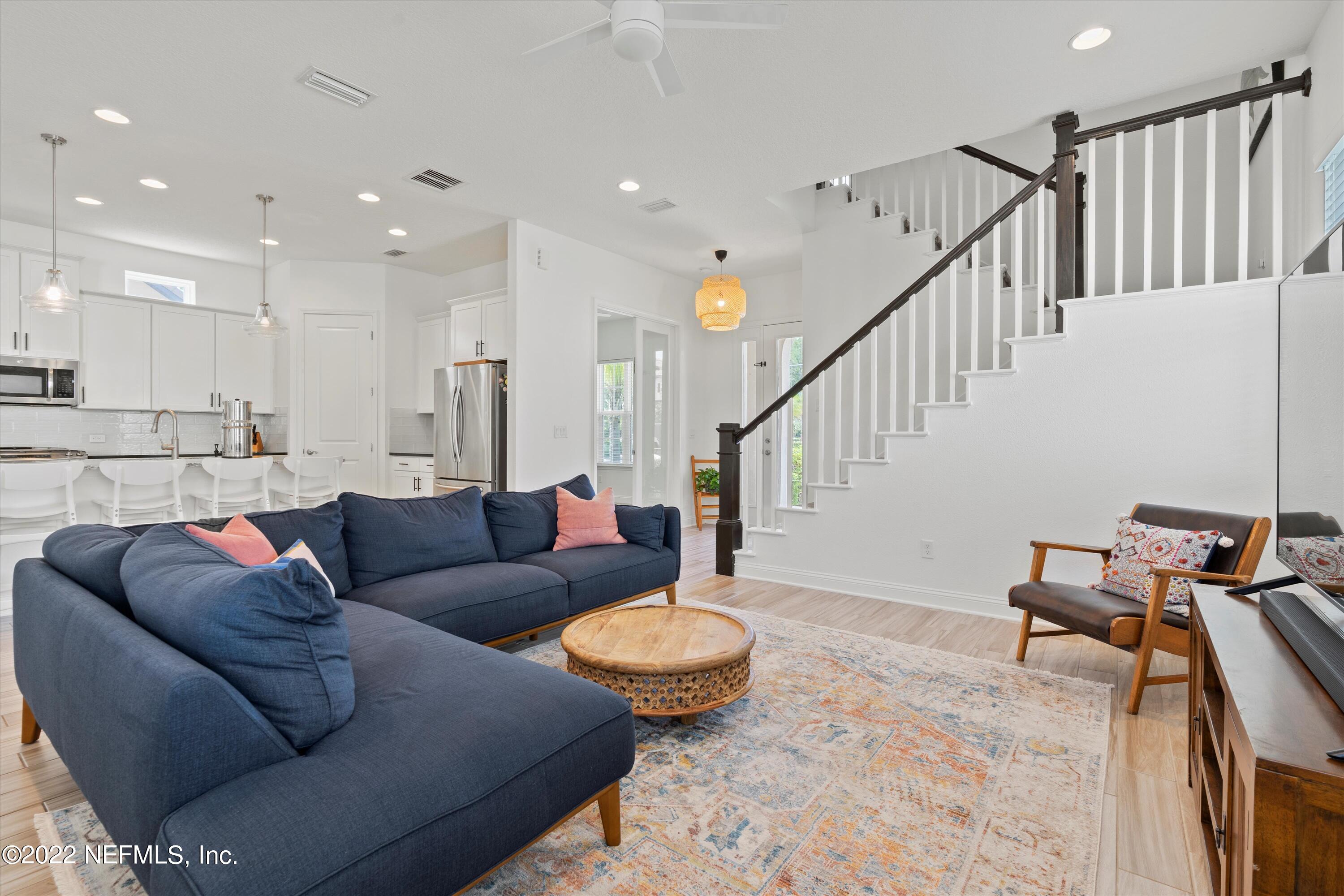 245 Rialto Drive Ponte Vedra, FL 32081 - Photo 7 of 29 a living room with furniture and a rug