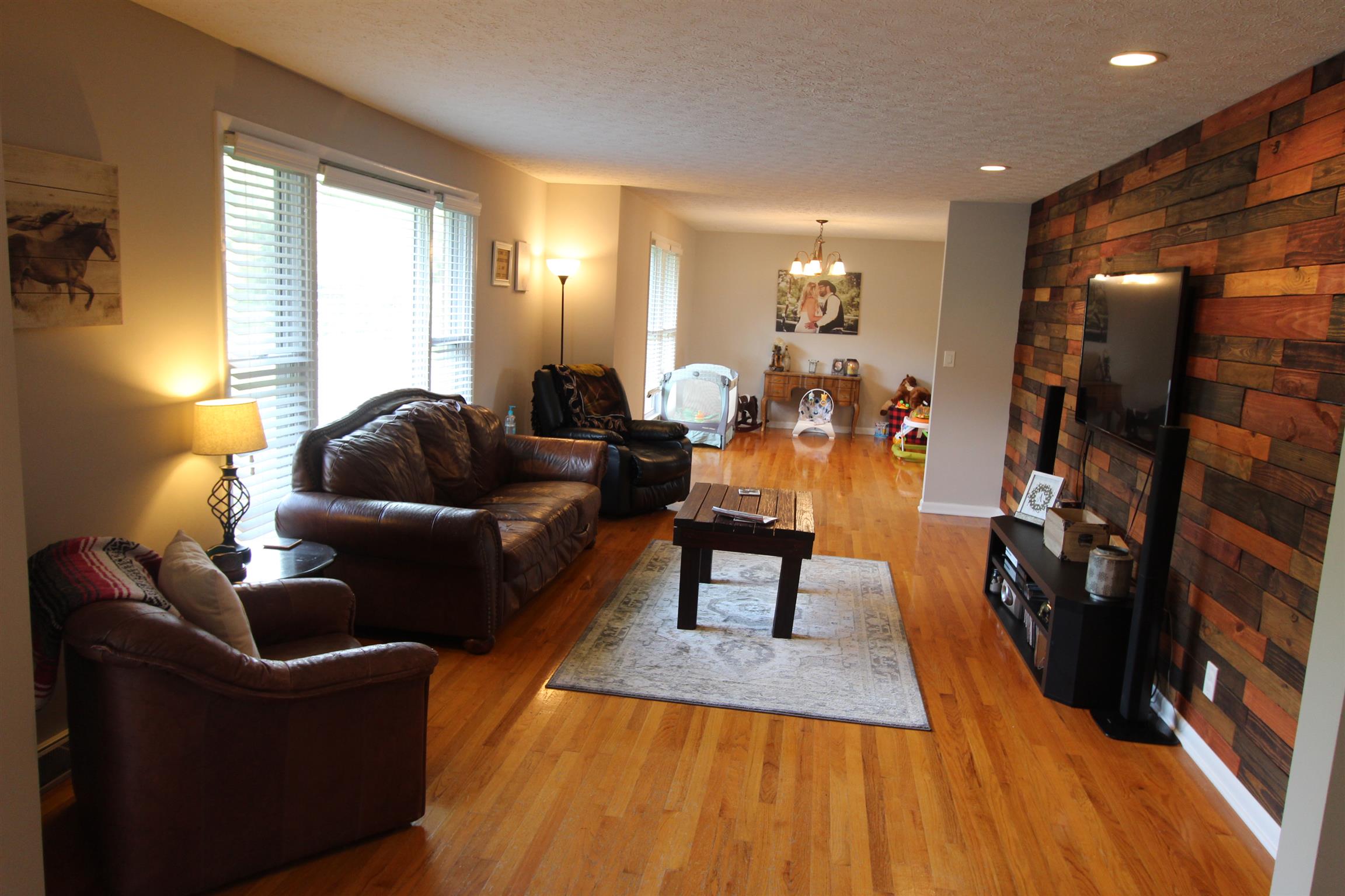 4240 Simmons Bluff Road Lebanon, TN 37090 - Photo 4 of 30 a living room with furniture and wooden floor