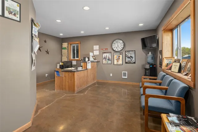 a view of kitchen with furniture and wooden floor