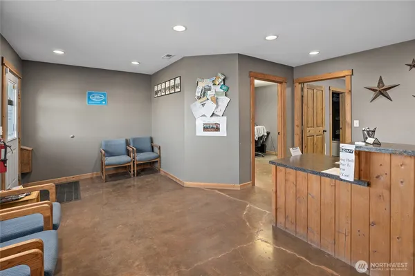 a view of a hallway with workspace