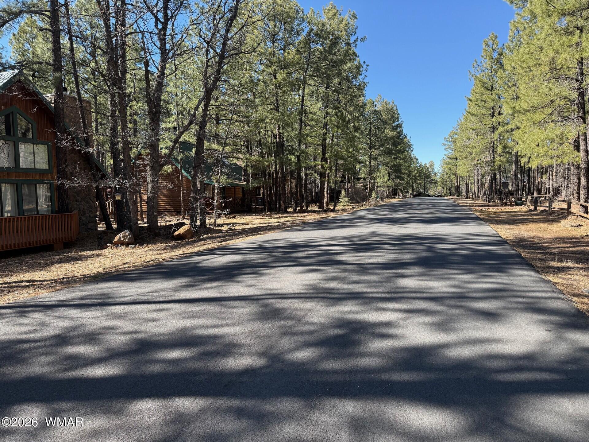 3430 Blacksmith Trail Pinetop, AZ 85935 - Photo 6 of 6 a view of a house with a yard