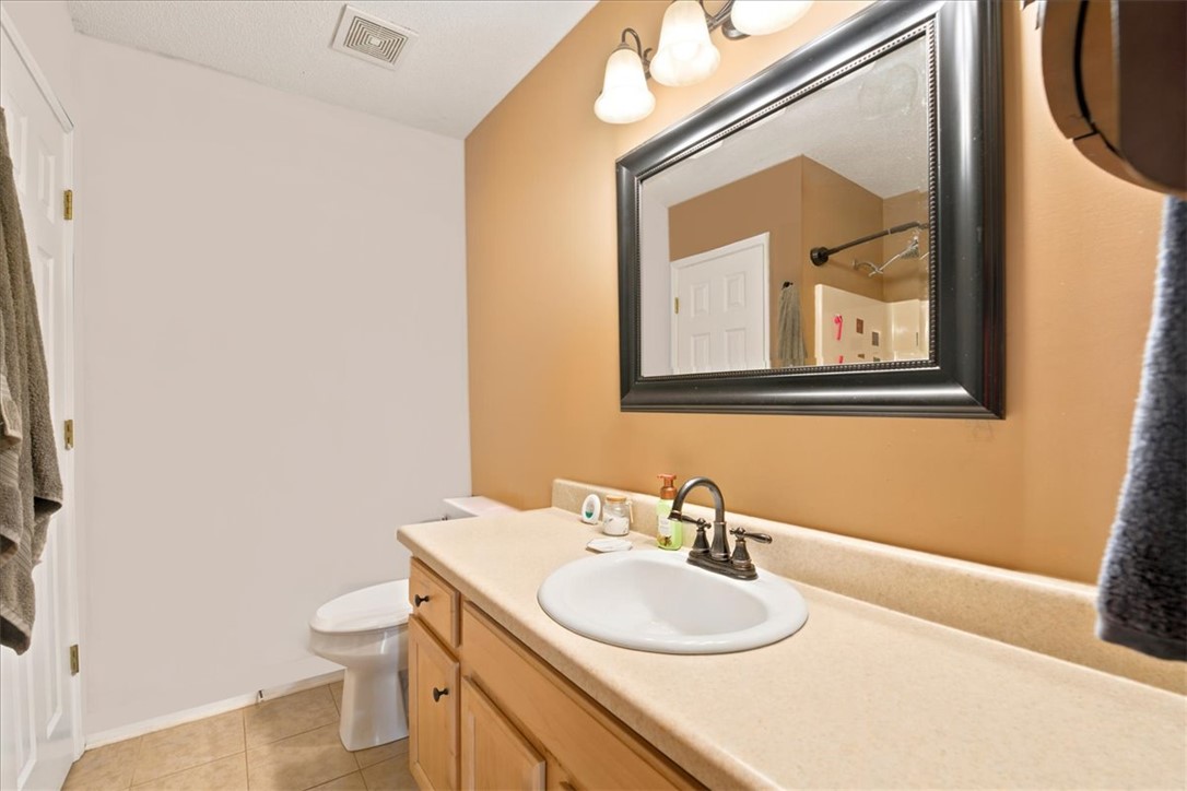 520 Sharon Lane Seneca, SC 29678 - Photo 25 of 48 Functional vanity with ample counter space, brightened by overhead lighting and a framed mirror.