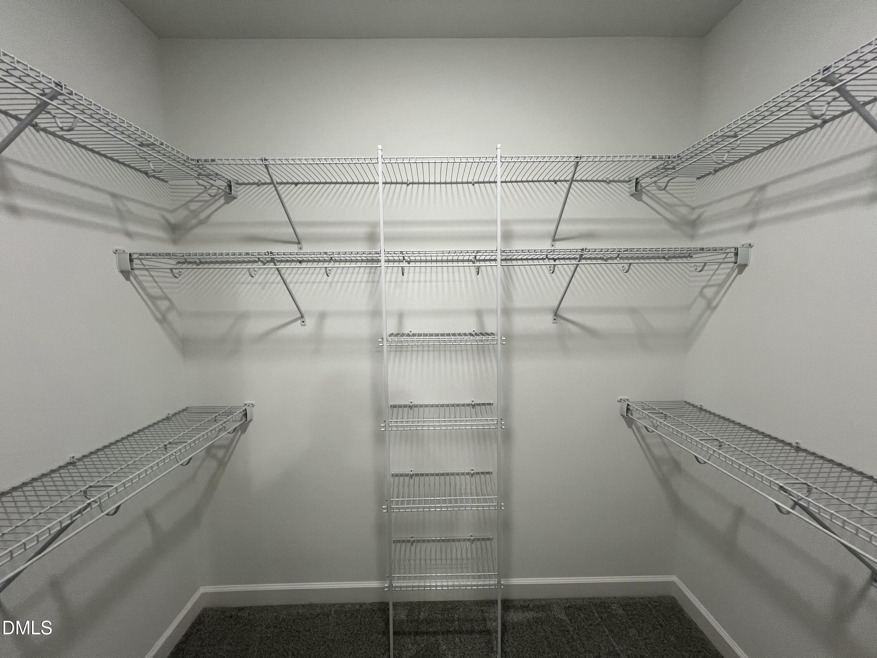 1552 Patterson Road Kinston, NC 28504 - Photo 11 of 23 a view of a room with racks on the wall