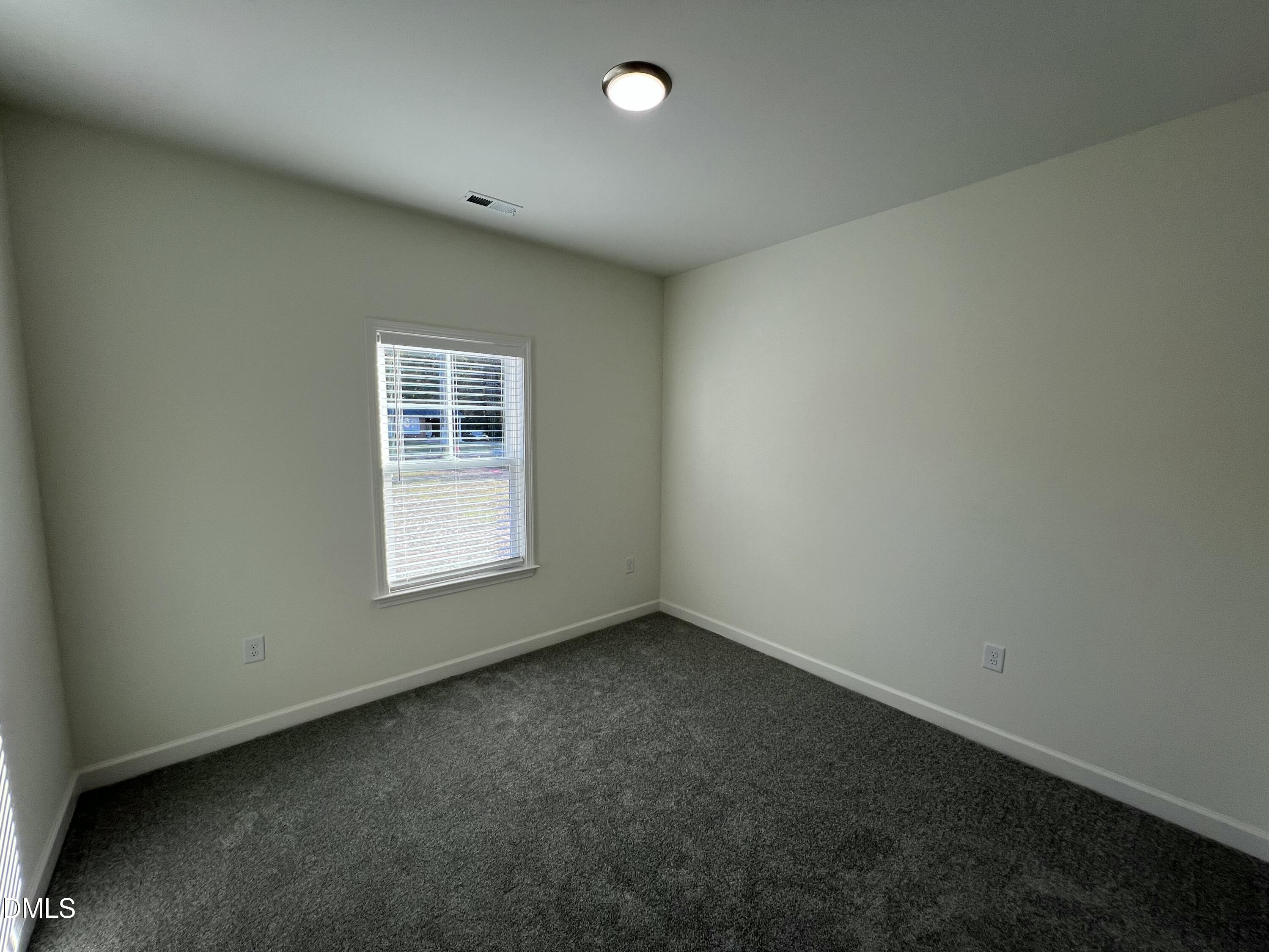 1552 Patterson Road Kinston, NC 28504 - Photo 14 of 23 an empty room with a window