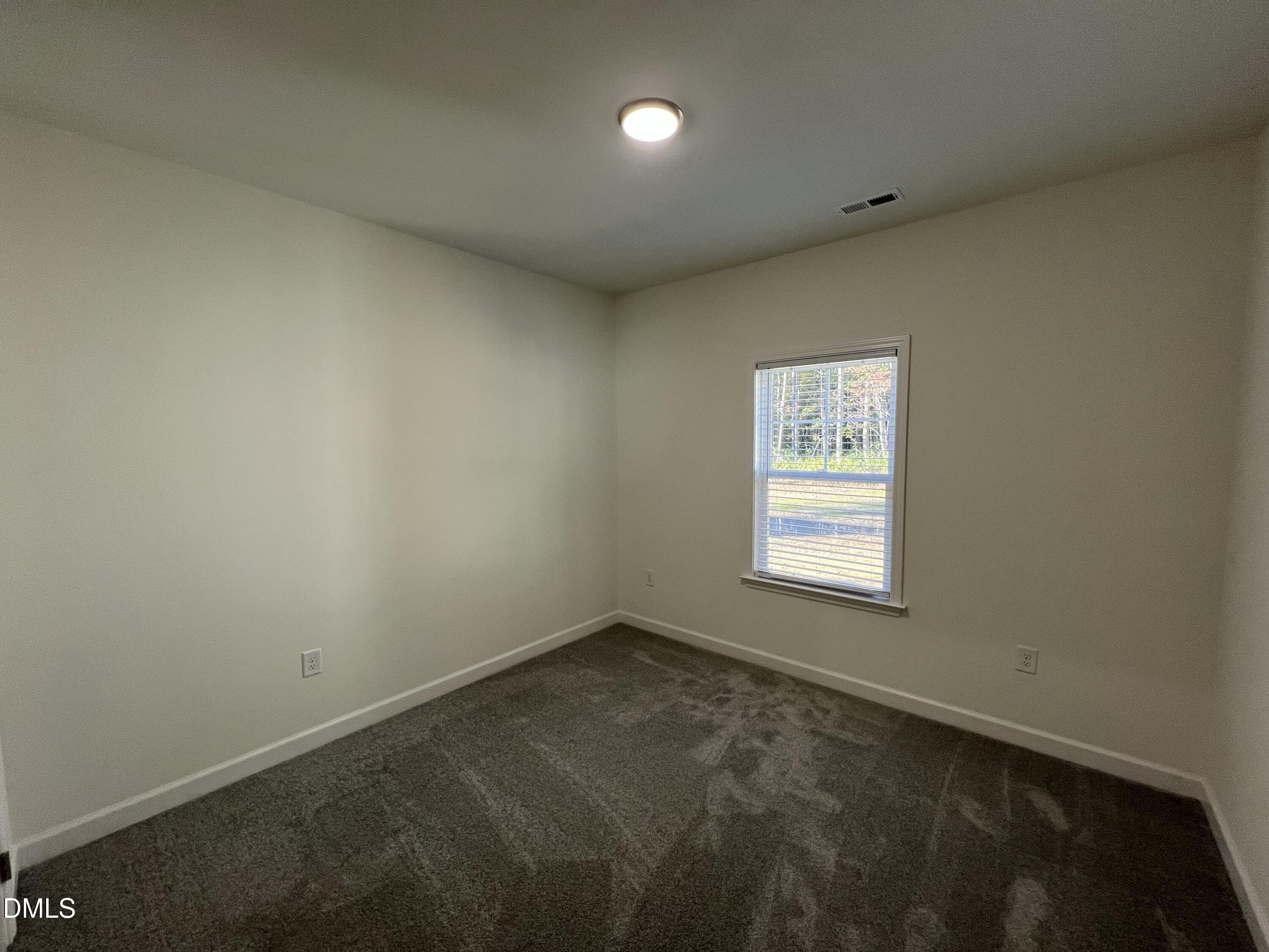 1552 Patterson Road Kinston, NC 28504 - Photo 16 of 23 an empty room with a window
