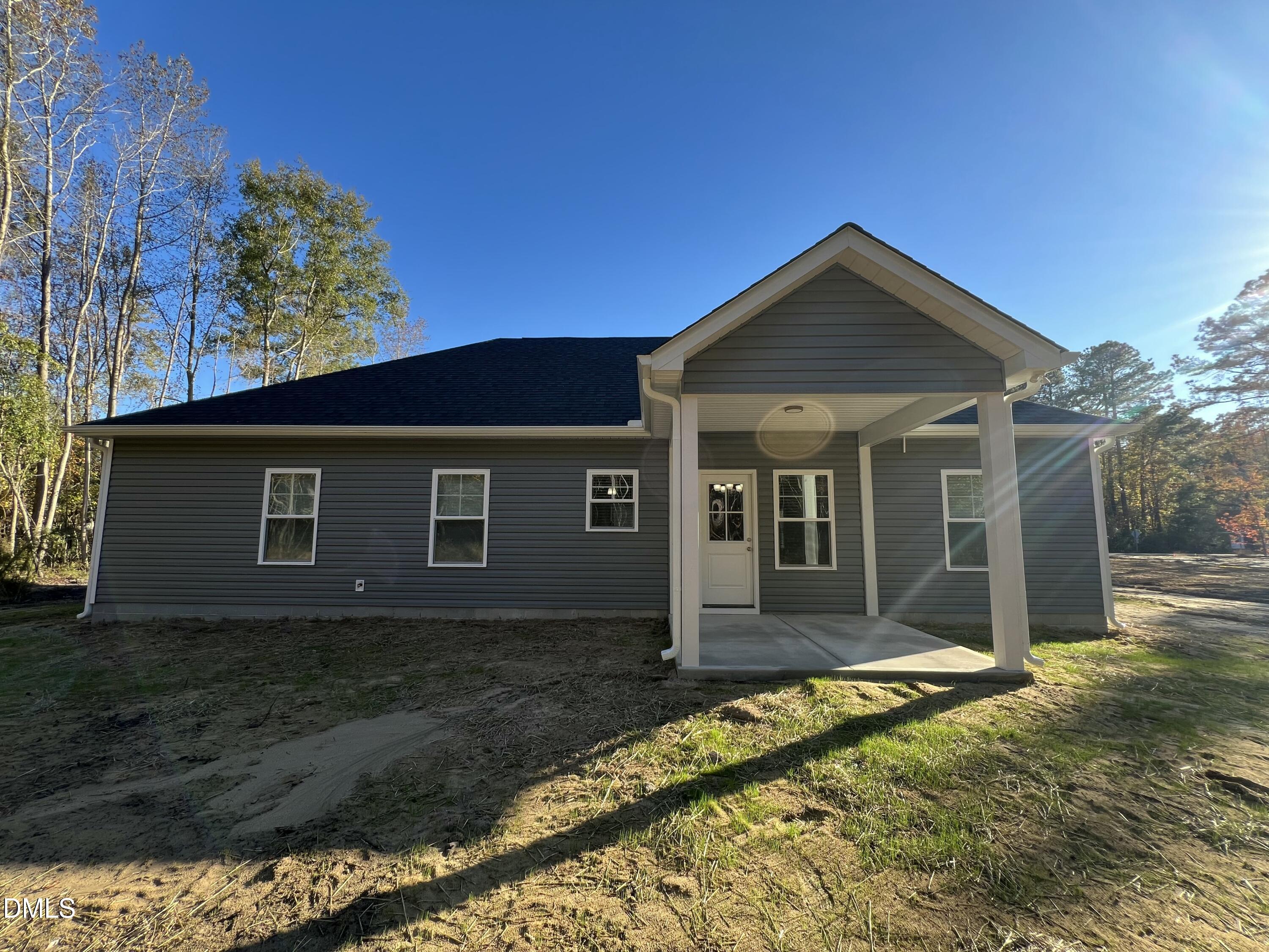 1552 Patterson Road Kinston, NC 28504 - Photo 22 of 23 a front view of a house with a yard