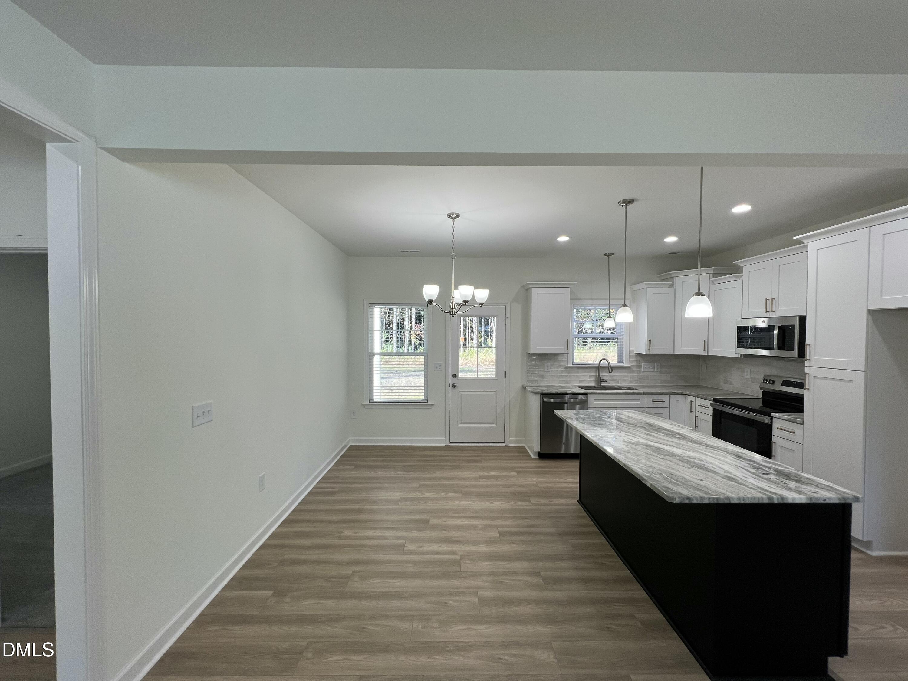 1552 Patterson Road Kinston, NC 28504 - Photo 5 of 23 a large kitchen with granite countertop lots of counter top space