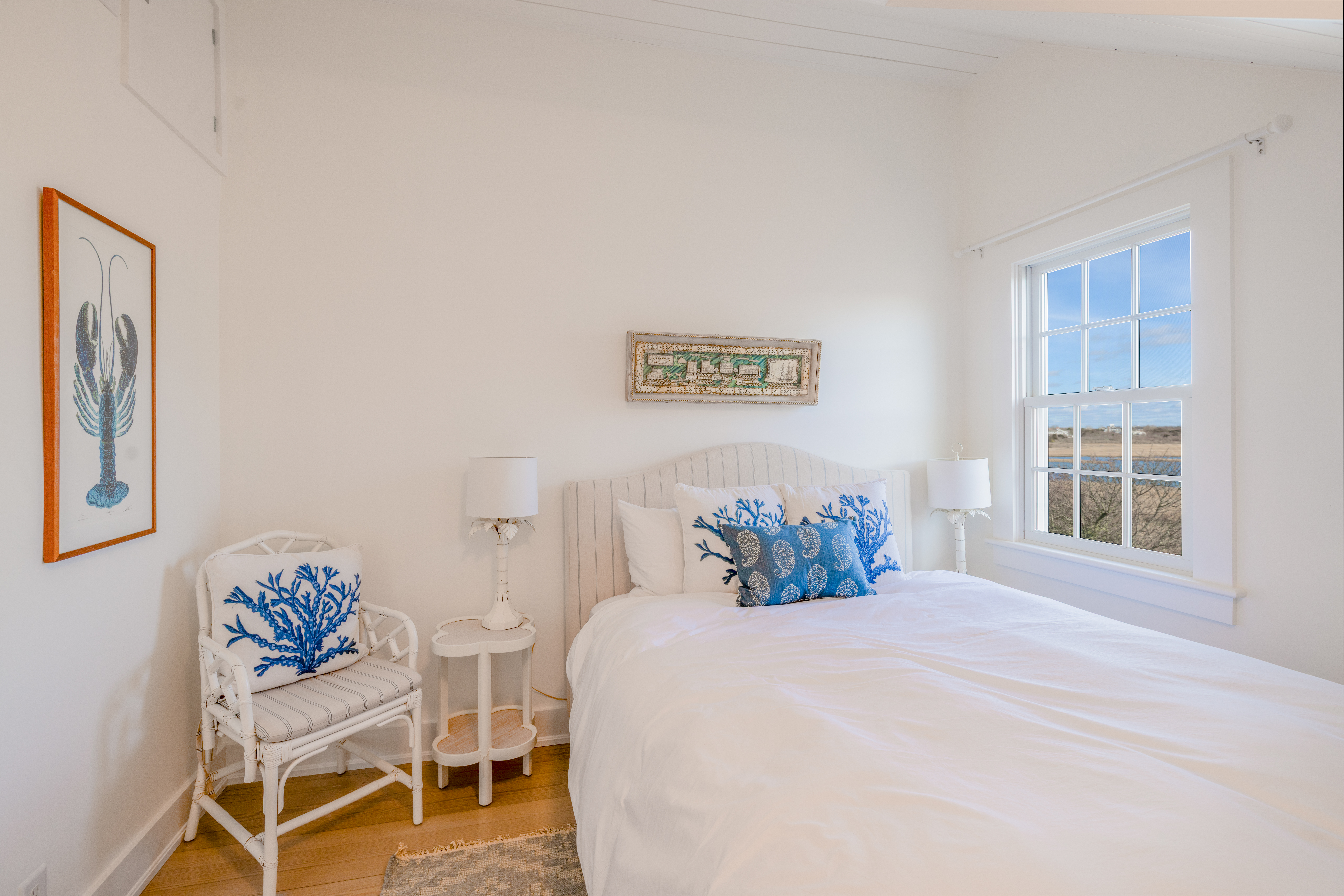 6 Harbor Terrace Nantucket, MA 02554 - Photo 17 of 18 a bedroom with a bed and a table
