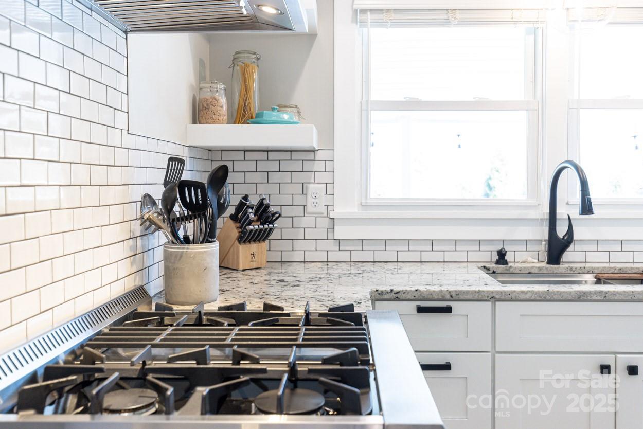29 Willowbrook Road, Unit 11 Asheville, NC 28805 - Photo 17 of 46 a kitchen with a sink and a stove