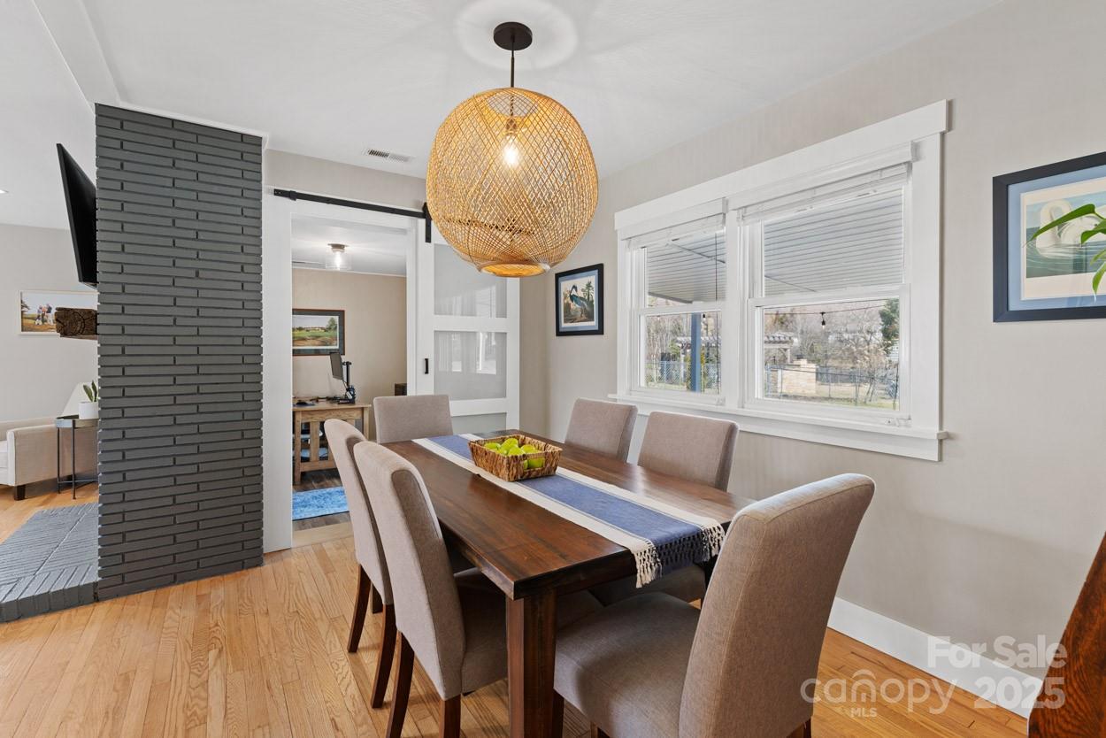 29 Willowbrook Road, Unit 11 Asheville, NC 28805 - Photo 19 of 46 a view of a dining room with furniture and wooden floor