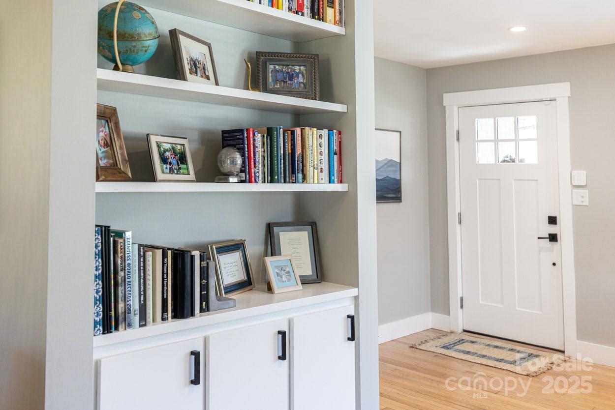 29 Willowbrook Road, Unit 11 Asheville, NC 28805 - Photo 22 of 46 a view of bedroom with furniture and book shelf