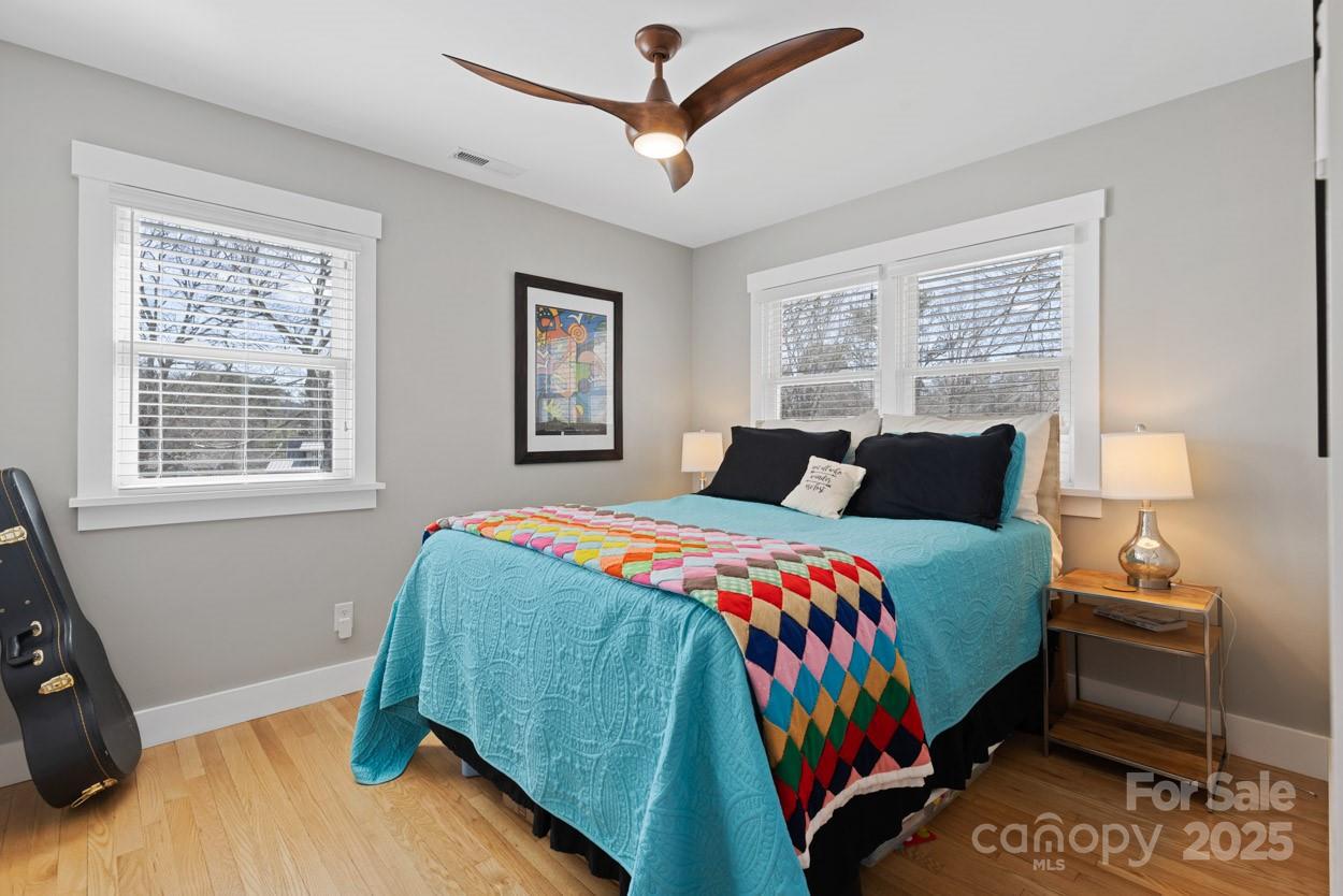 29 Willowbrook Road, Unit 11 Asheville, NC 28805 - Photo 31 of 46 a bedroom with a bed a dresser next to a window
