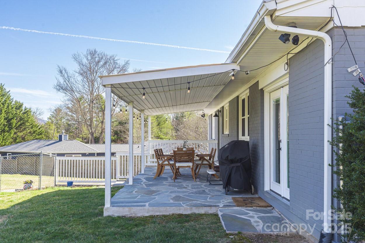 29 Willowbrook Road, Unit 11 Asheville, NC 28805 - Photo 37 of 46 a view of a house with backyard and porch