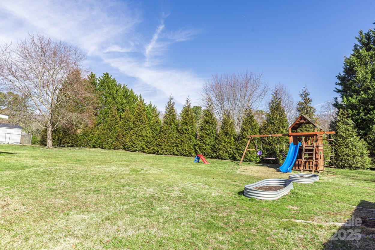 29 Willowbrook Road, Unit 11 Asheville, NC 28805 - Photo 39 of 46 a view of a playground with a slide